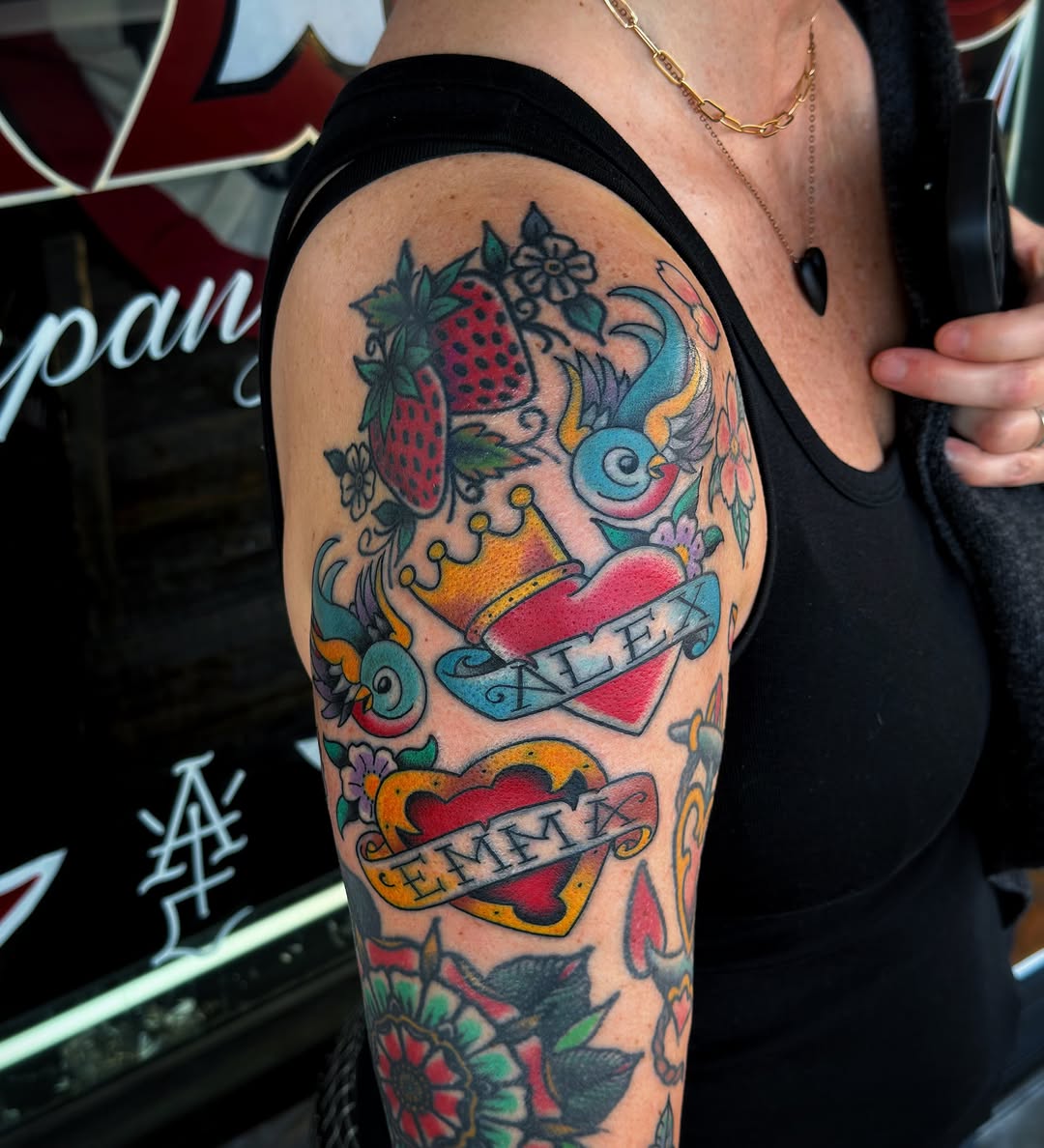 Heart and crown American traditional tattoo on the upper arm by @sloanxkettering