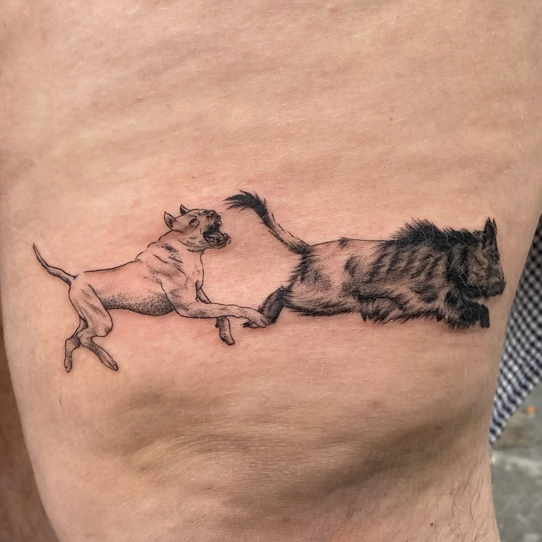 Lion and cheetah black and grey tattoo on the thigh by Mack ๐ Utah Tattoos