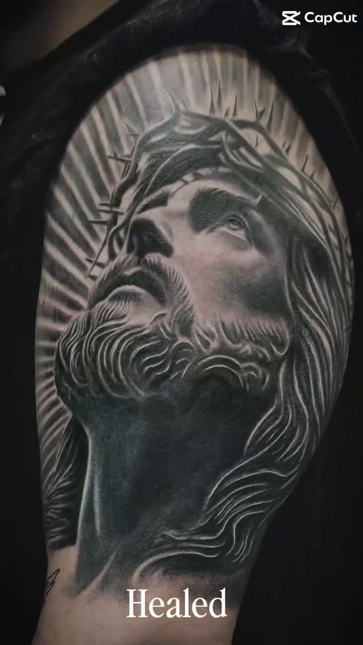 Jesus Christ portrait realism tattoo by Charlie Soto