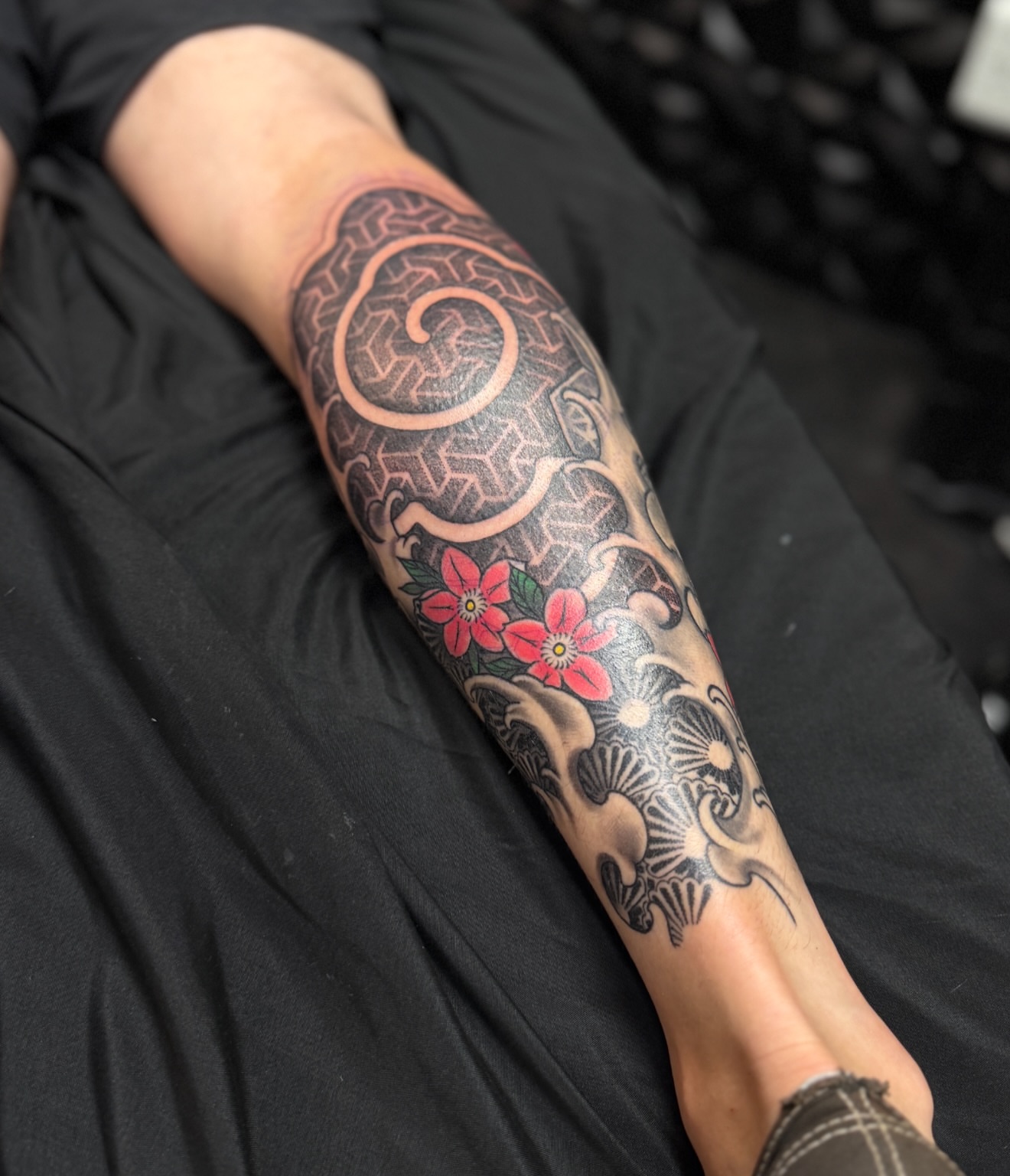 Floral swirl japanese irezumi tattoo on the forearm by Rikky Bobby, Mesa, Arizona