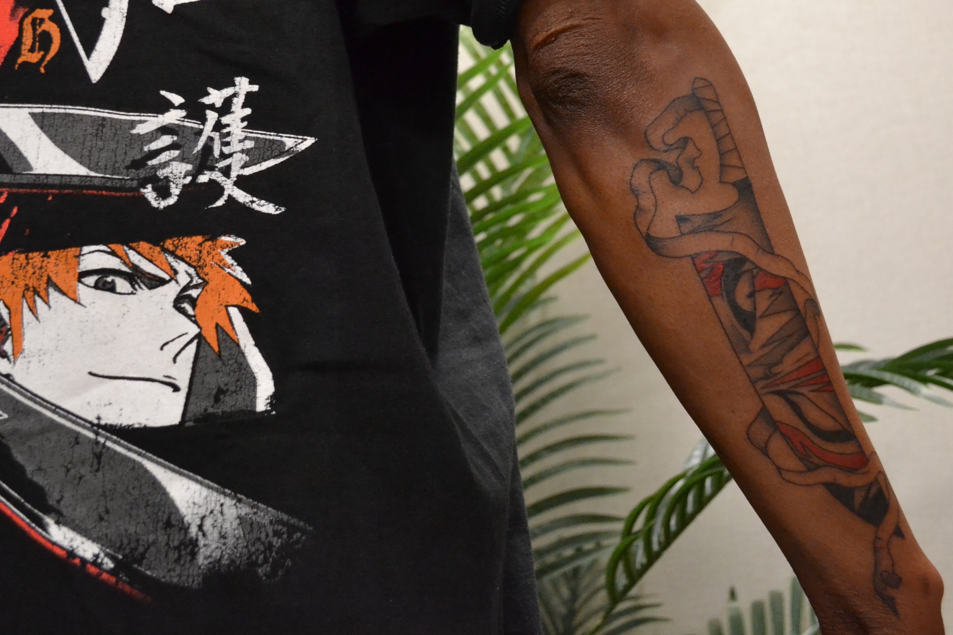Anime character anime tattoo on the forearm by Vanessa Acosta