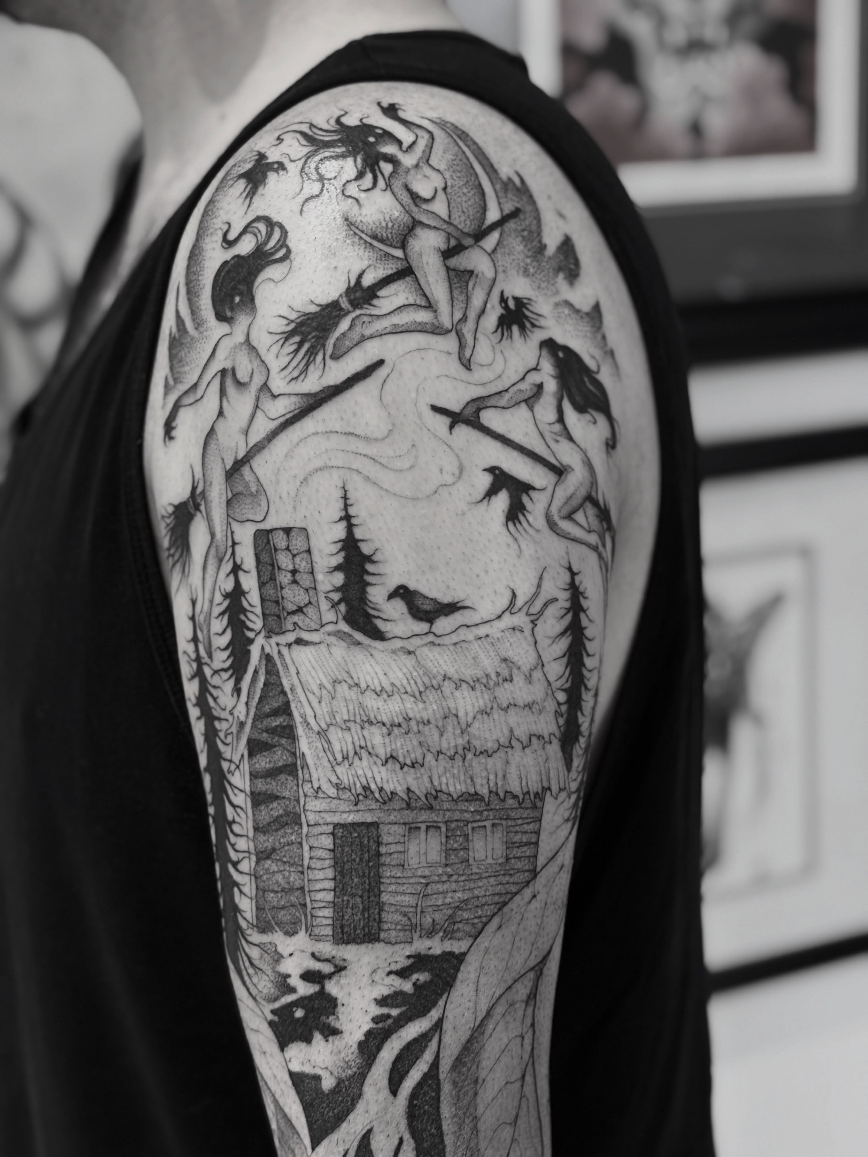 Forest cabin realism tattoo on the upper arm by Becci Chelicerata