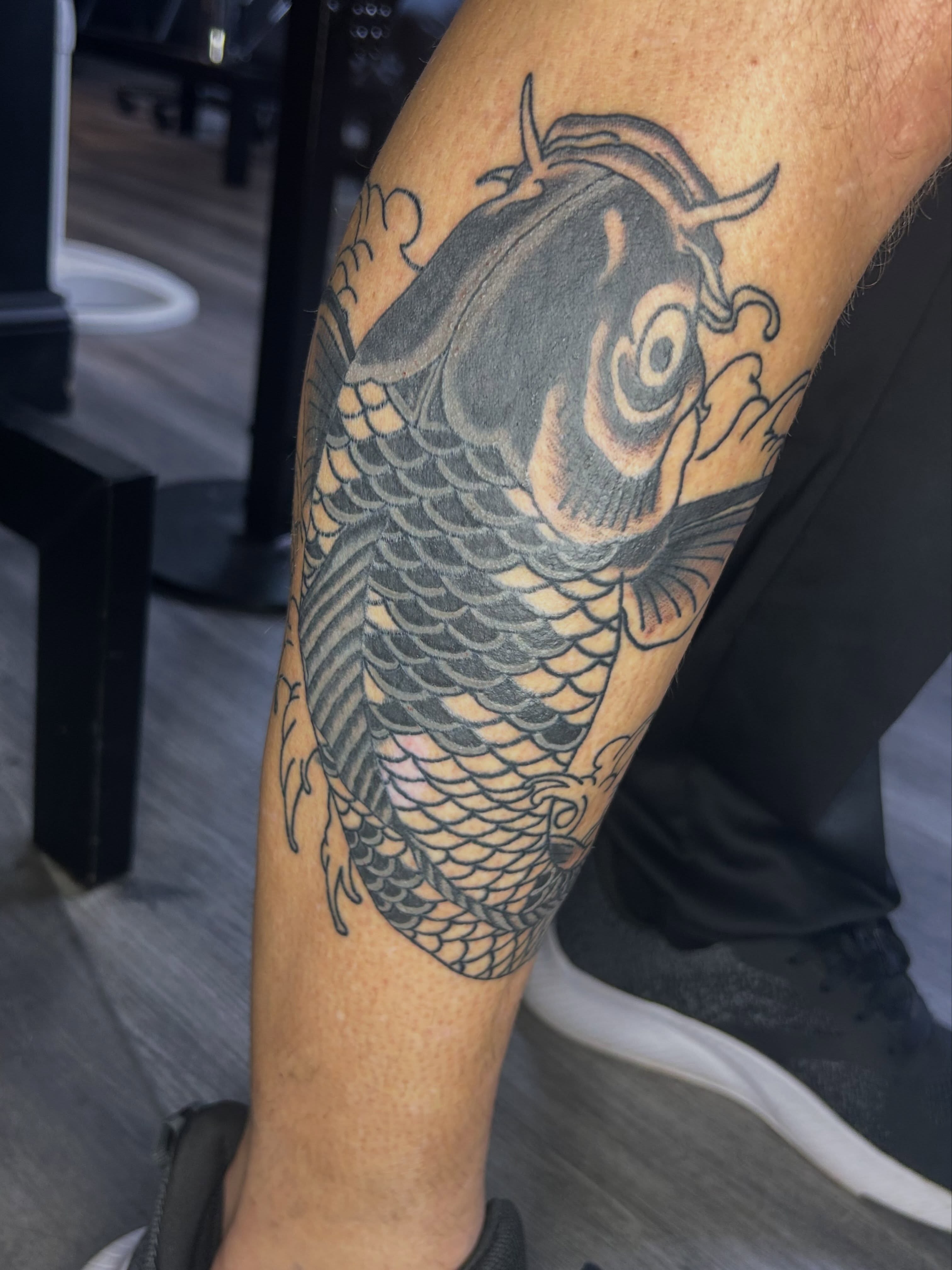 Koi fish japanese irezumi tattoo on the forearm by Zach Andrews
