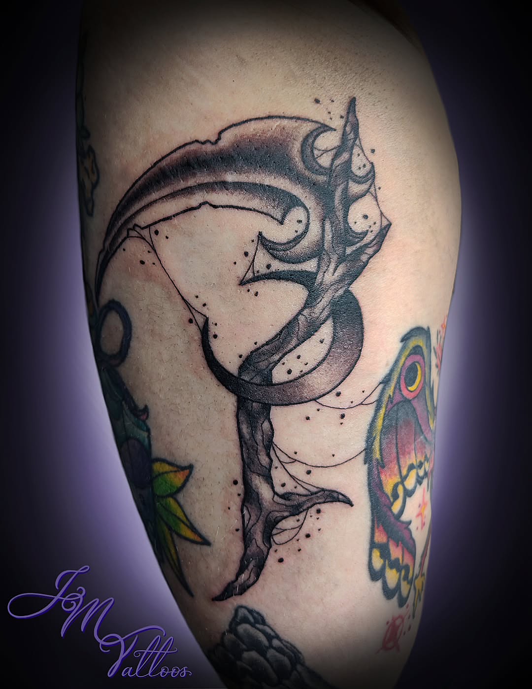 Serpent and bird dotwork tattoo on the forearm by Julie MacDonald