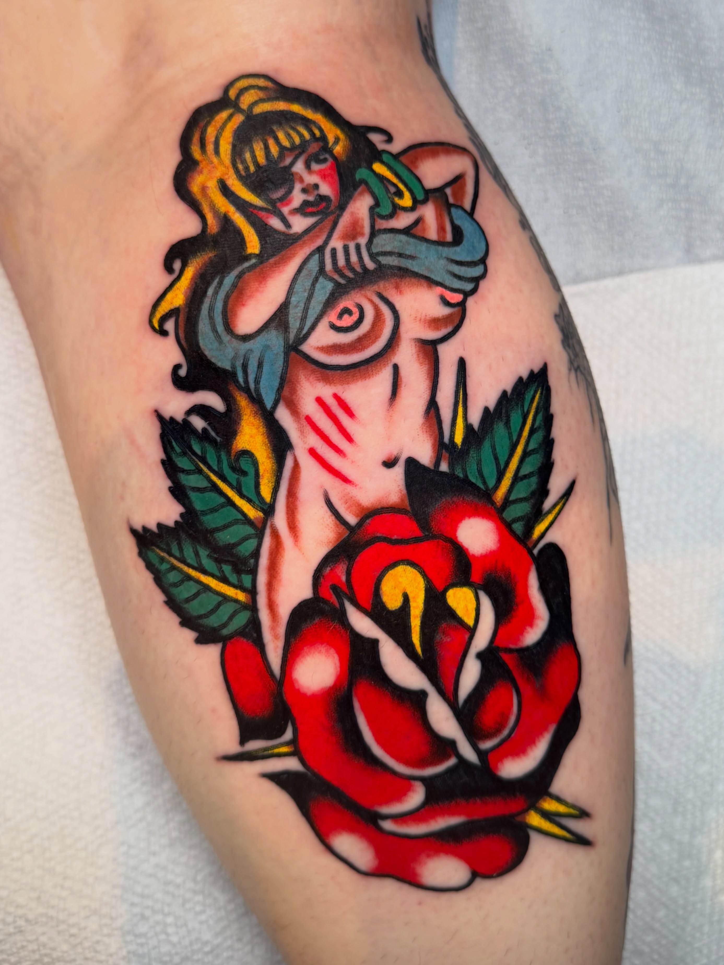 Woman with roses American traditional tattoo on the forearm by 💥Jeff Klug💥, Austin, Texas