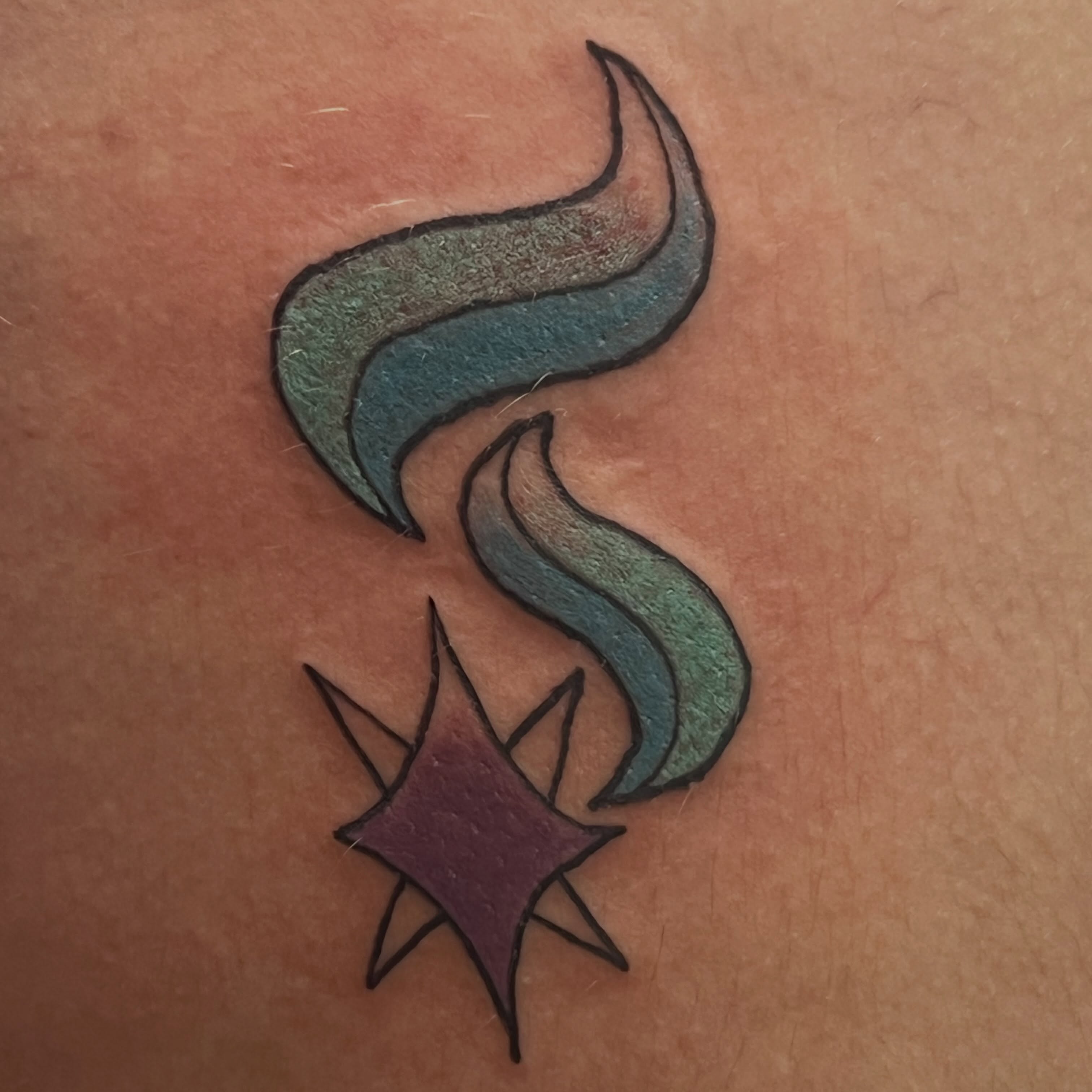 Smoke and star geometric tattoo on the forearm by Tomfoolery