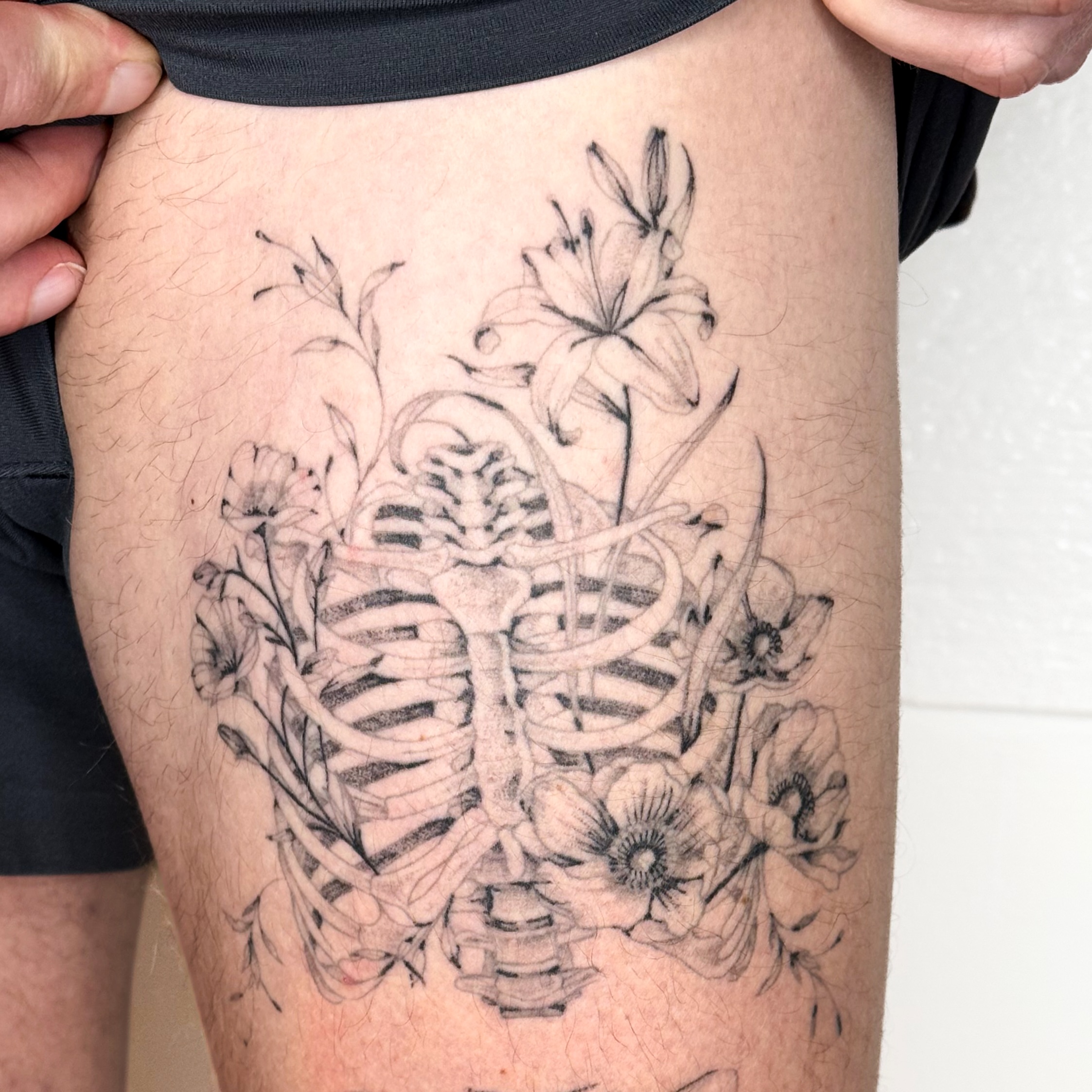 Rib cage with flowers realism tattoo on the thigh by ❁ Marlo Marquise Tattoo Artist ❁