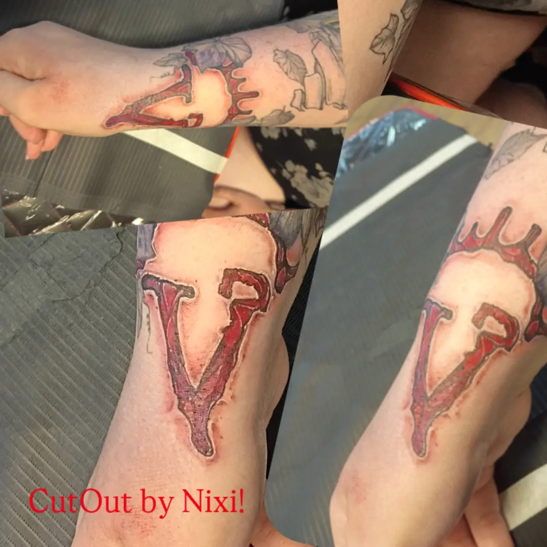 Letter V realism tattoo on the forearm by Niki Jackson
