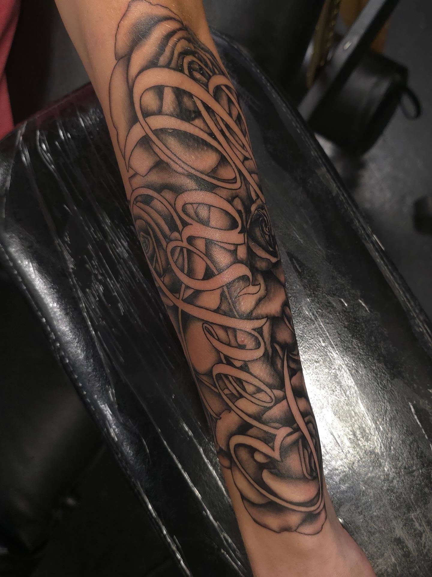 Roses fine line tattoo on the forearm by Trinity