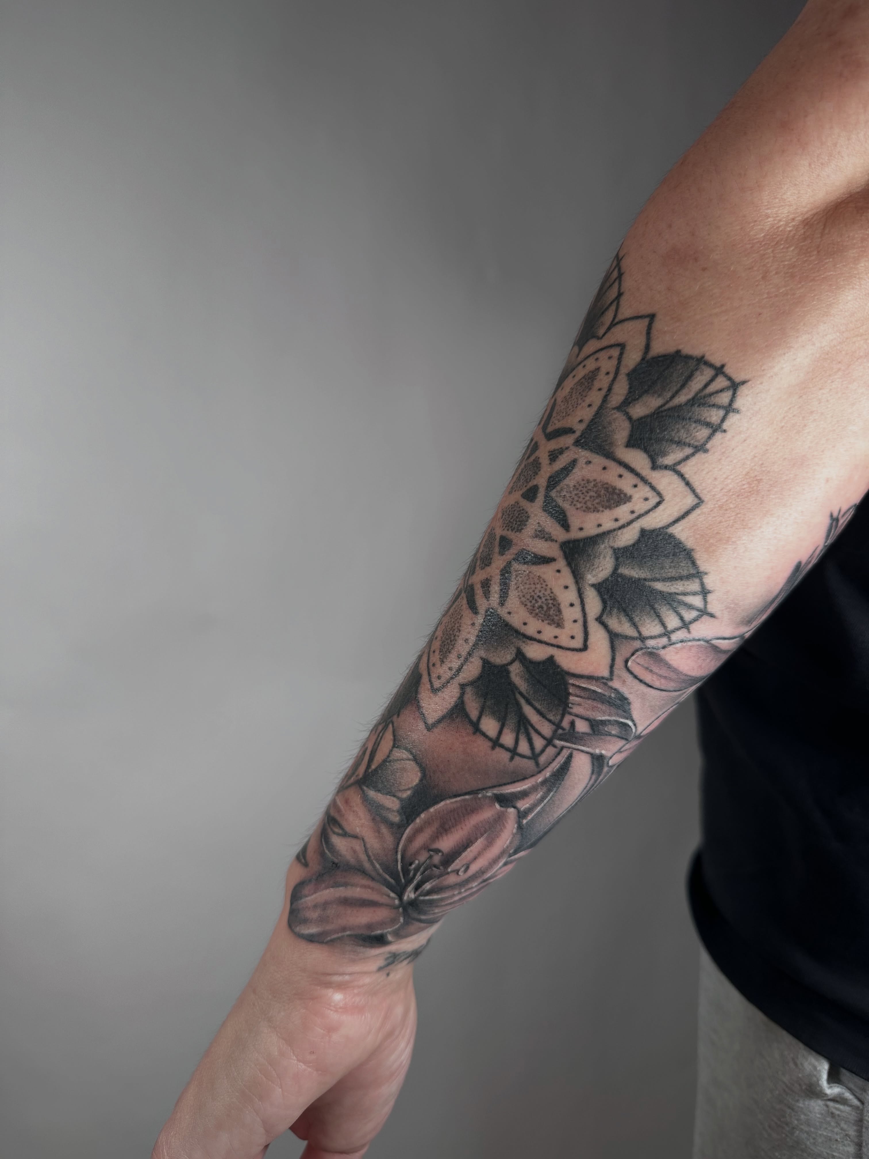 Floral mandala dotwork tattoo on the forearm by Heather Cherish