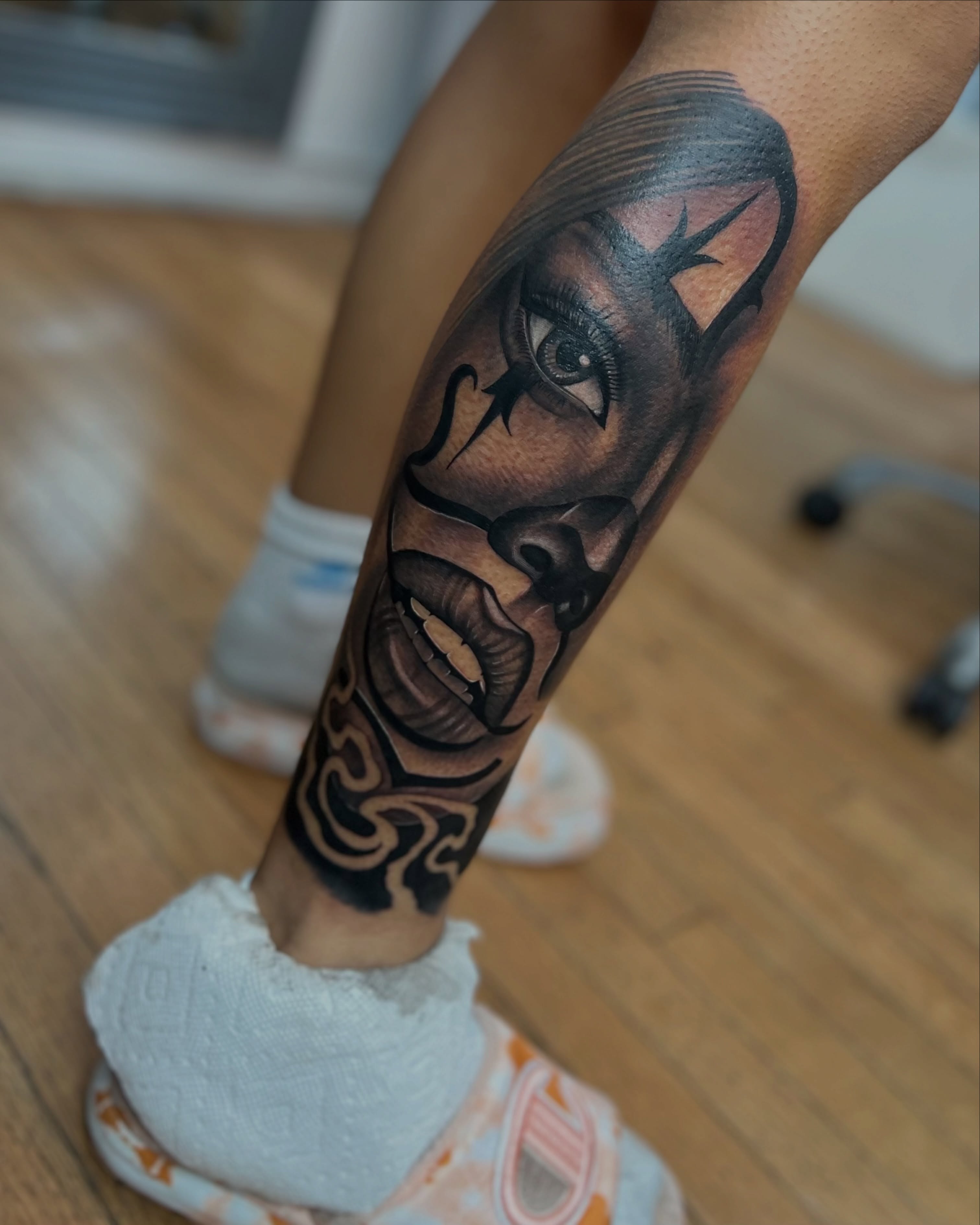 Clown face realism tattoo on the forearm by Licensed Tattoo Artist πΈπ»