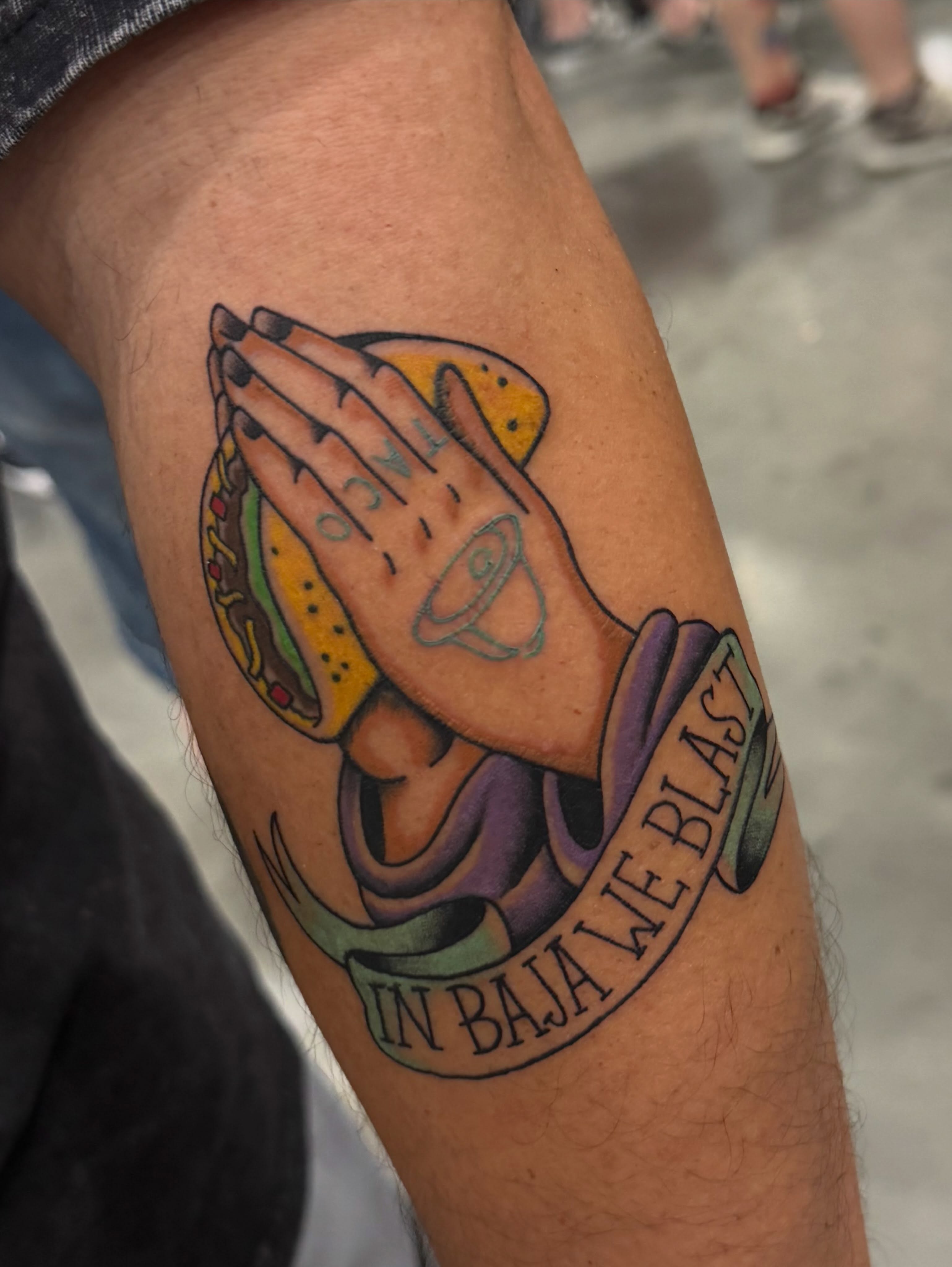 Praying hands with taco Chicano tattoo on the forearm by Alaska ⚜️