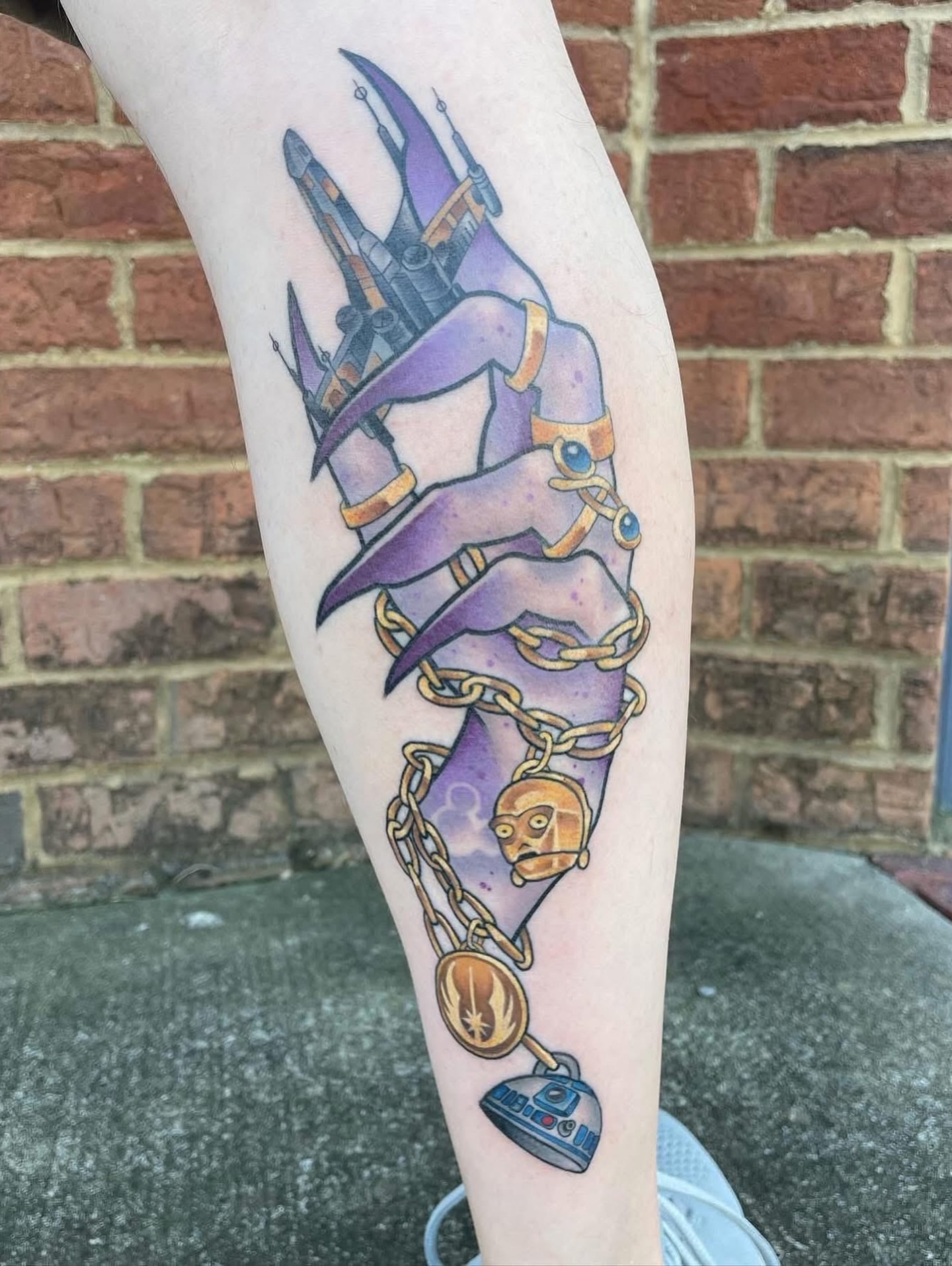 Droid and chains anime tattoo on the forearm by Sam Castro