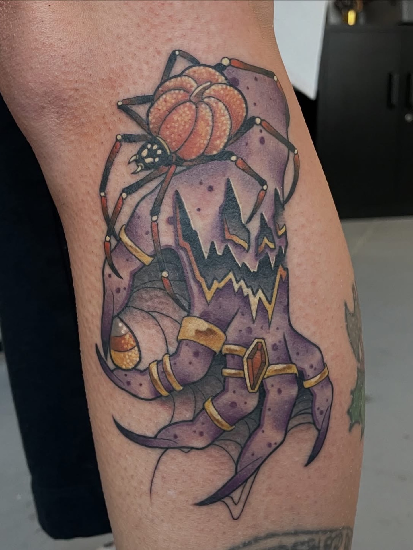 Spider dotwork tattoo on the thigh by Sam Castro