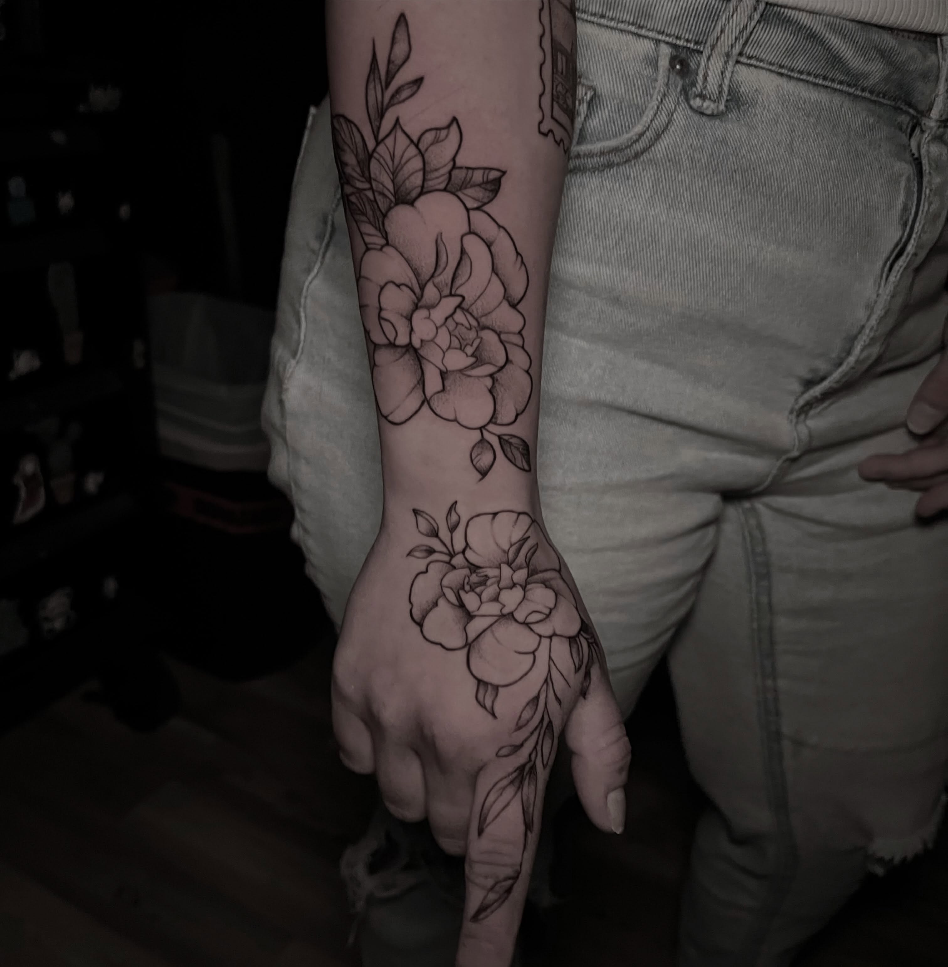 Peony flowers black and grey tattoo on the forearm by James Richardson