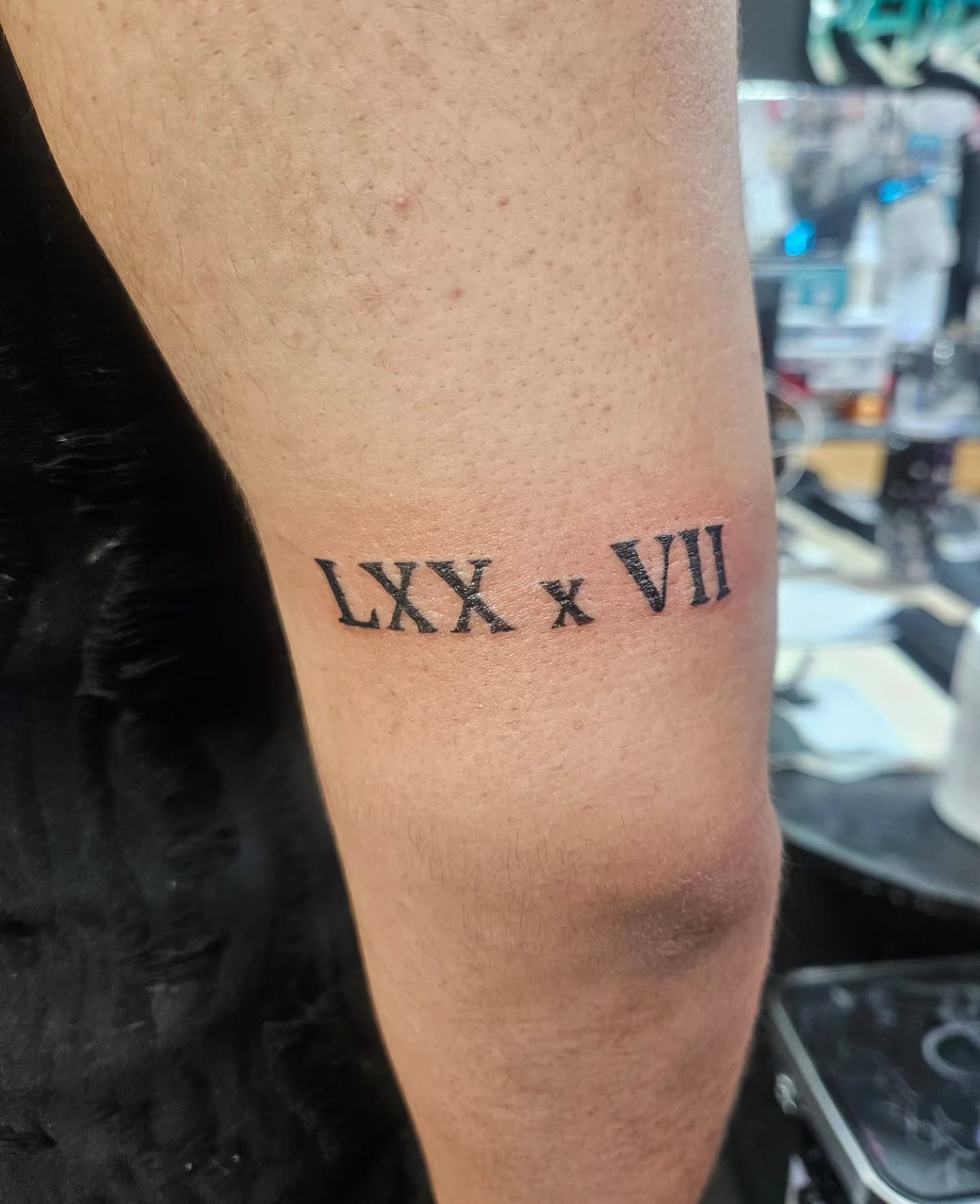 Roman numerals black and grey tattoo on the forearm by Mischief π€