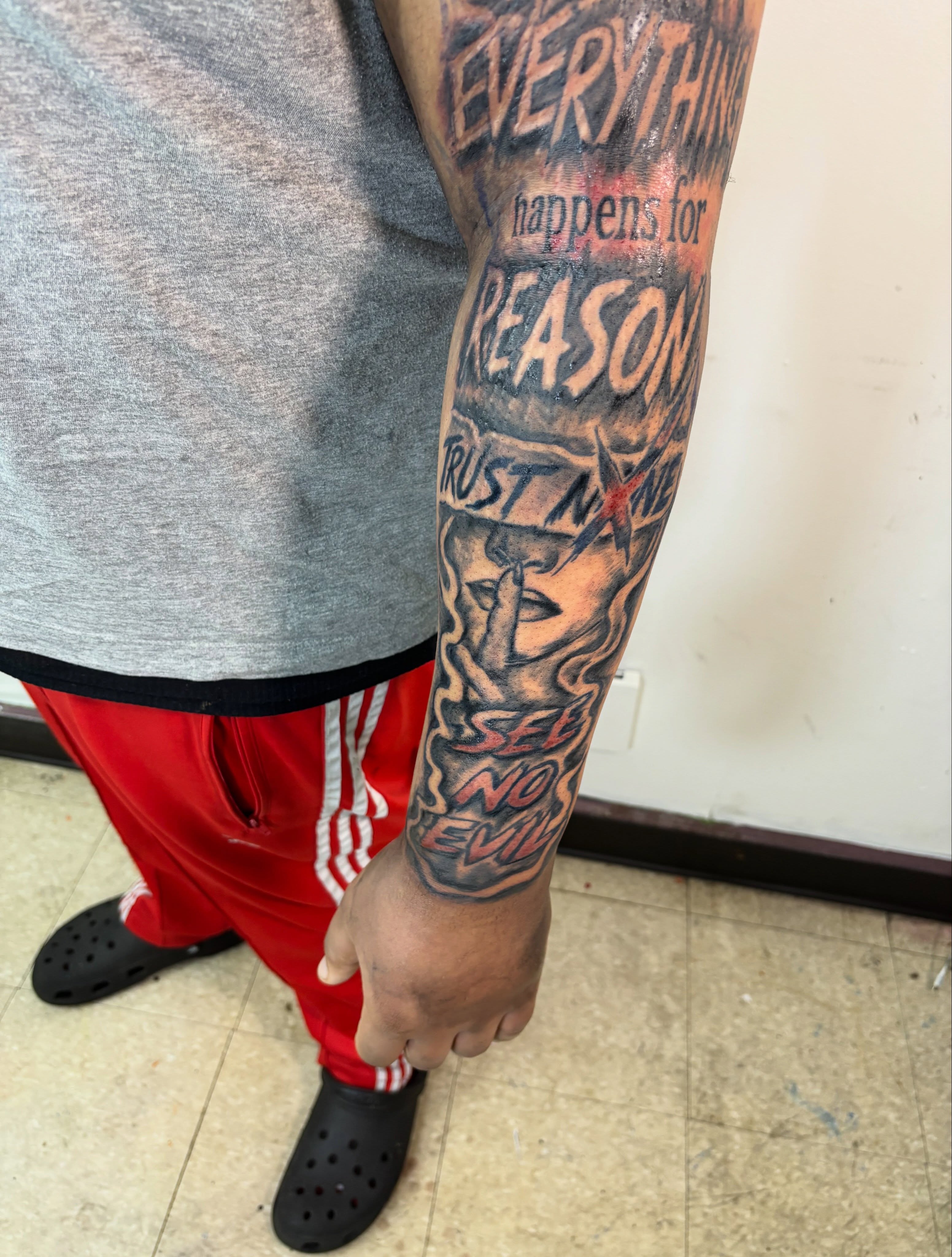 Motivational quote black and grey tattoo on the forearm by Exotic Motion🌪️