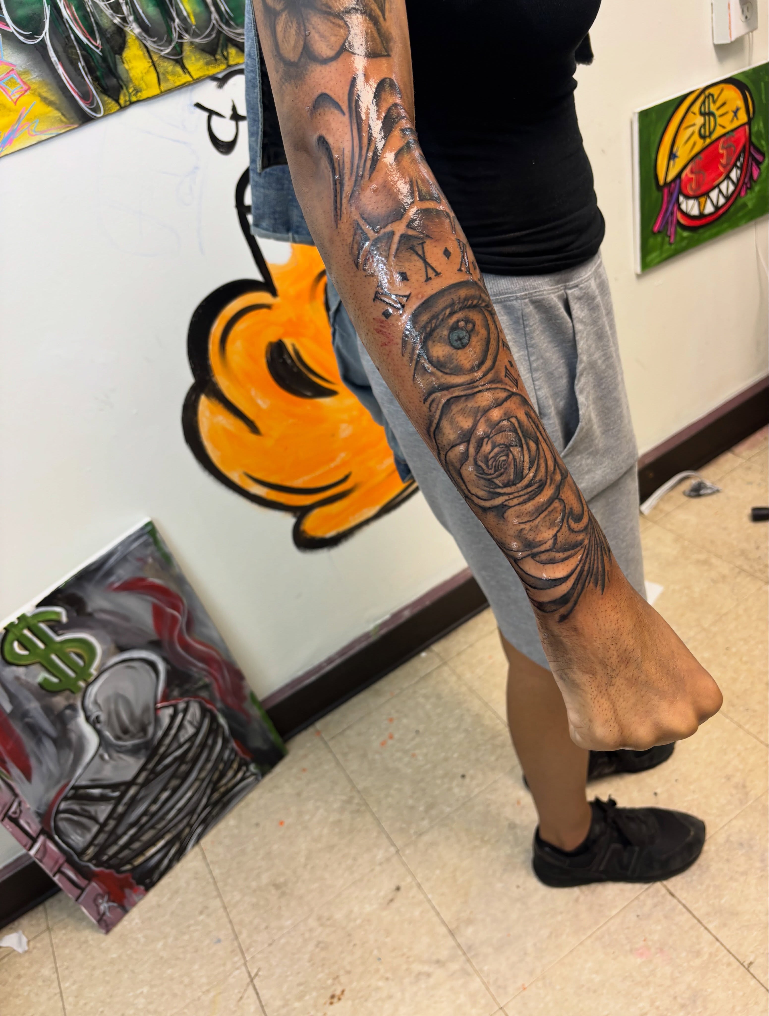 Eye and rose realism tattoo on the forearm by Exotic Motion🌪️