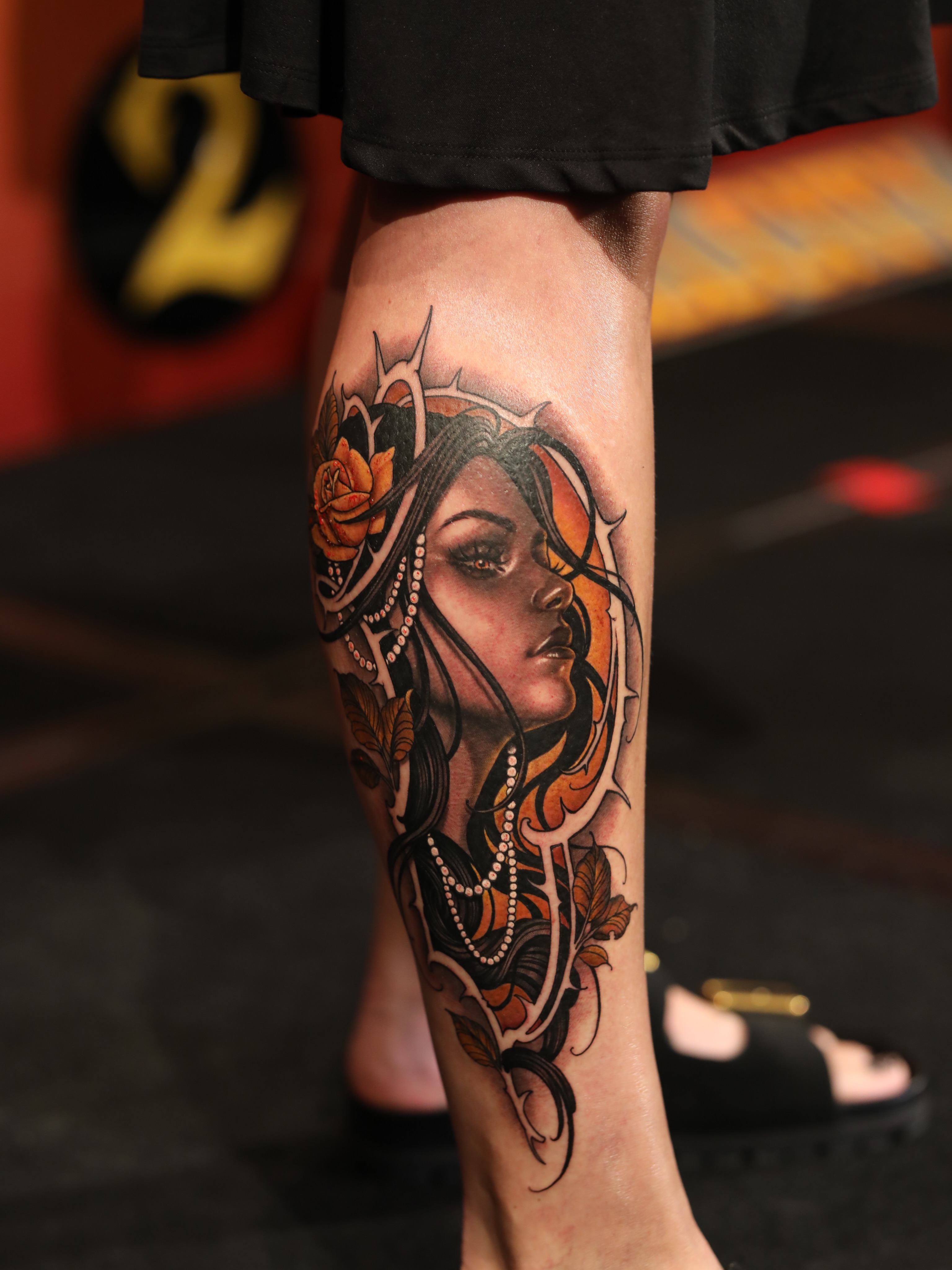 Woman with crown neo-traditional tattoo on the calf by Durb