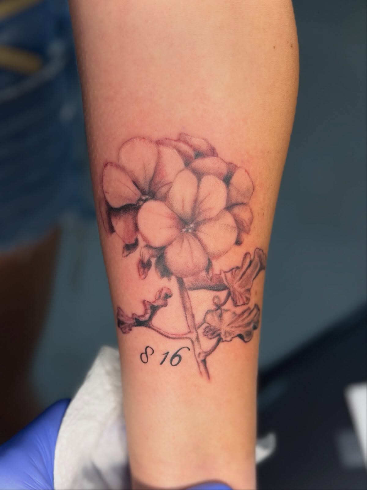Flower realism tattoo on the forearm by sᴋᴇᴛᴄʜᴇᴅ