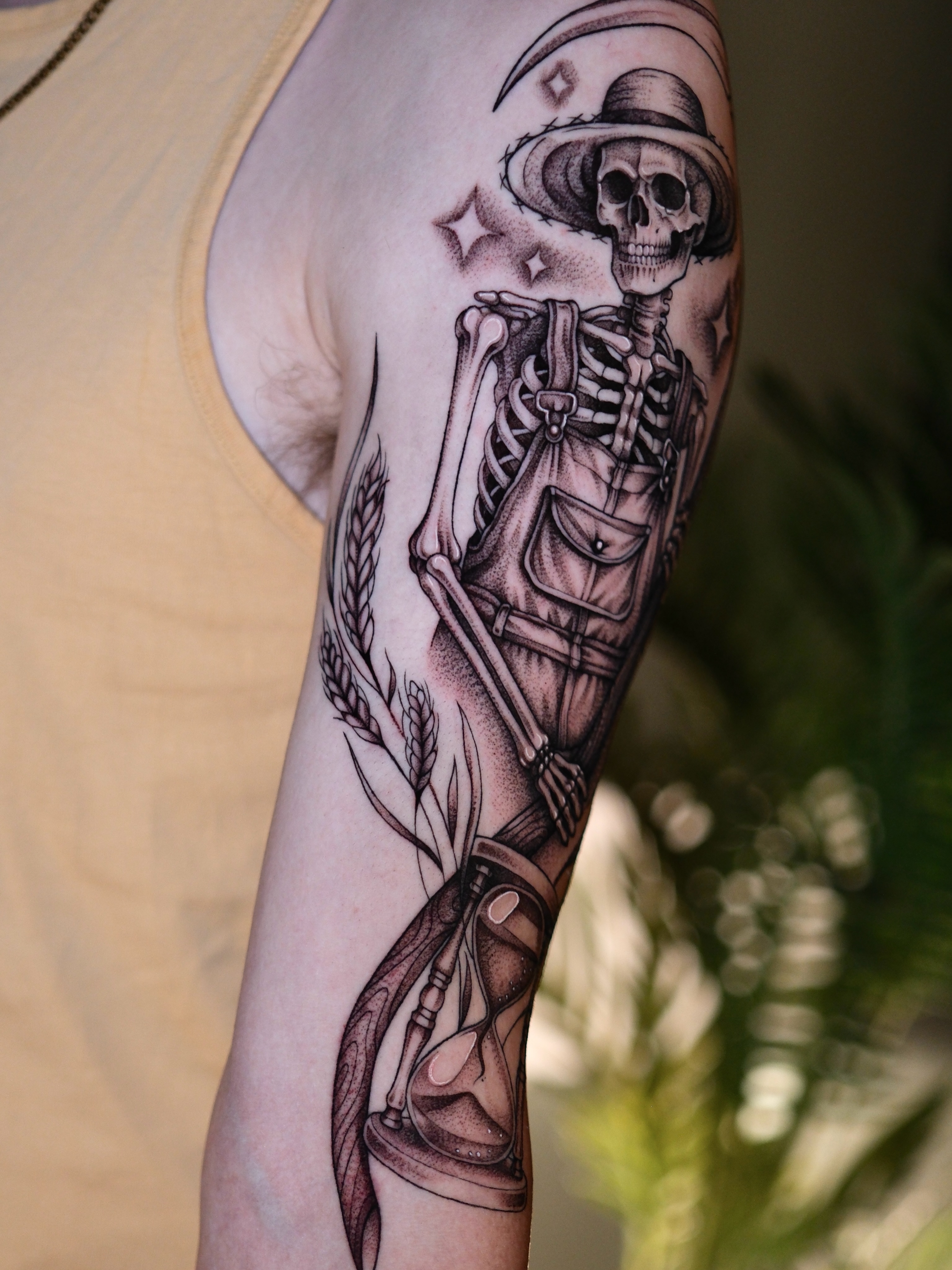 Skeleton with hourglass realism tattoo on the forearm by IVY