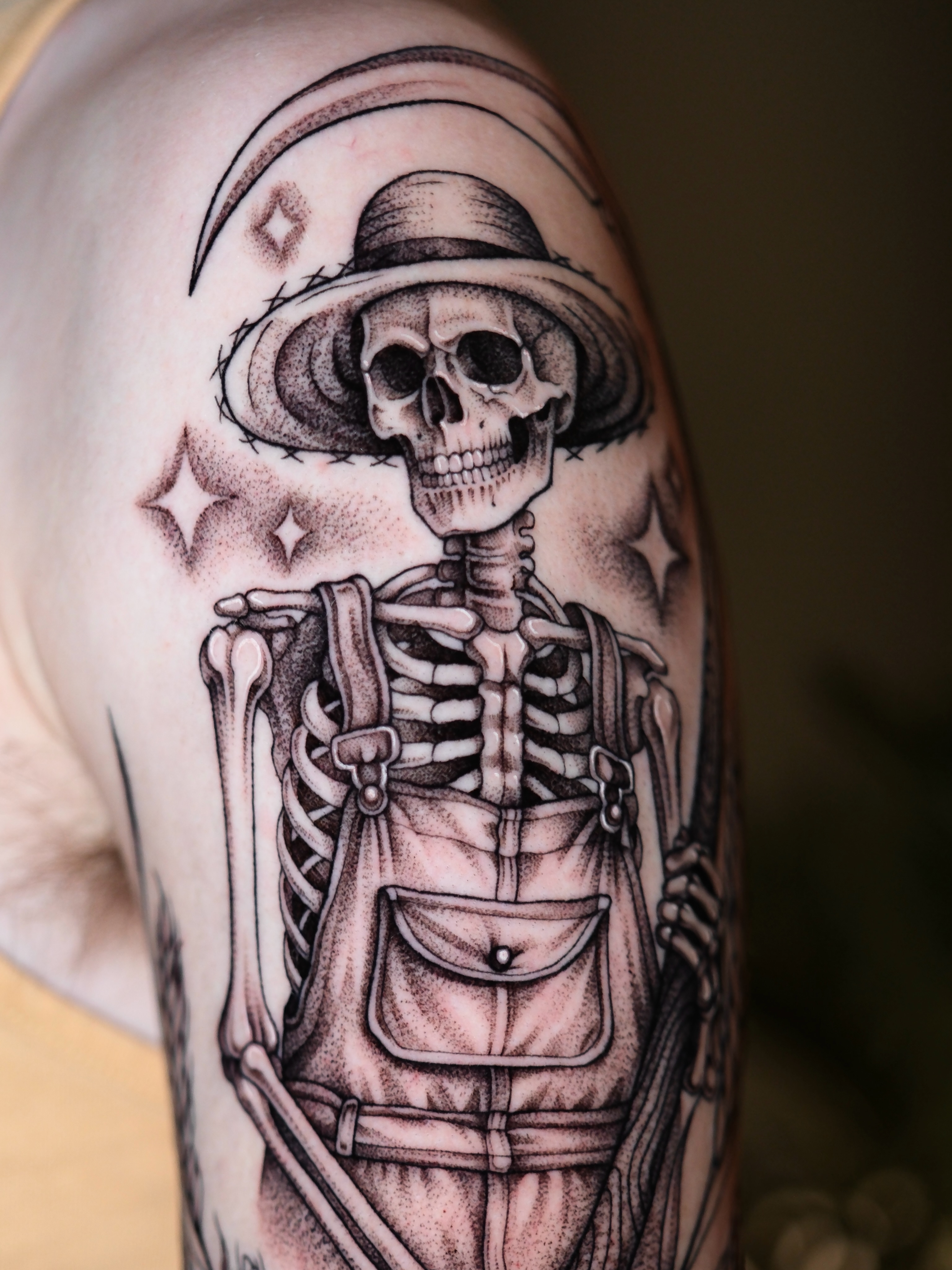 Skeleton in sombrero dotwork tattoo on the shoulder by IVY