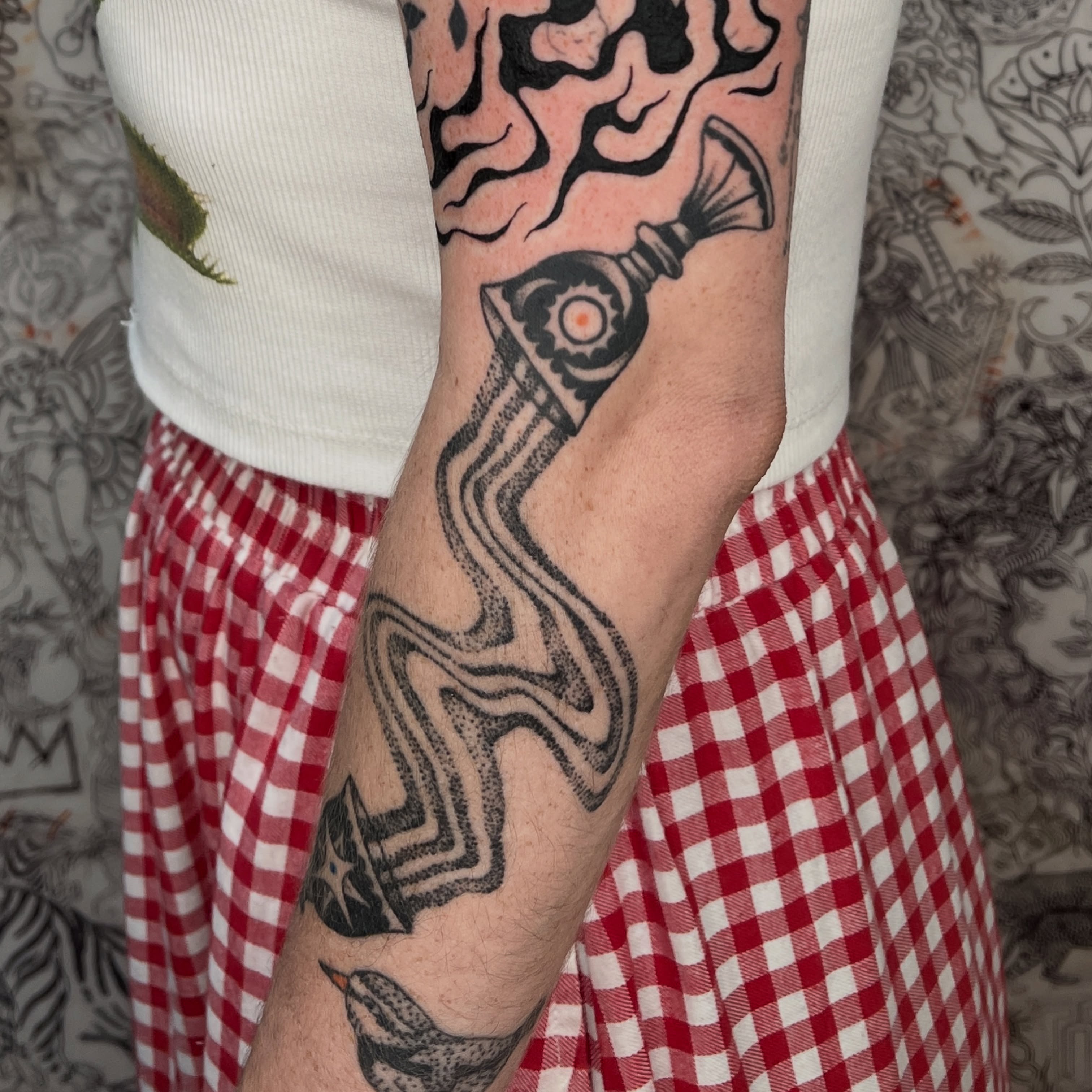 Abstract bottle black and grey tattoo on the forearm by Elleree (LRE)