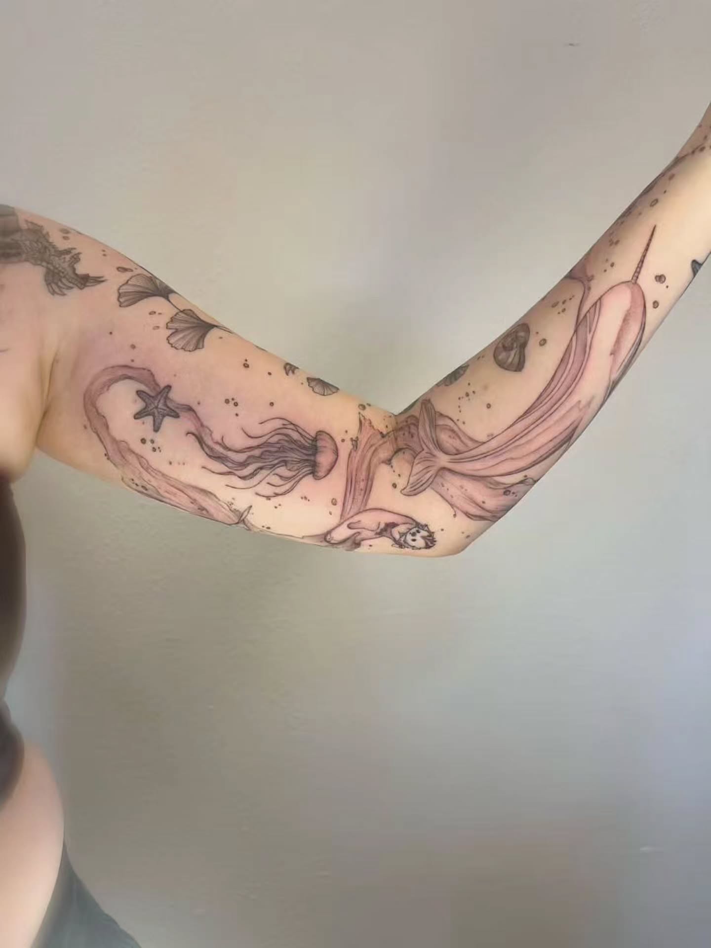 Mermaid and jellyfish black and grey tattoo on the forearm by Kite.Tattoo_Amber