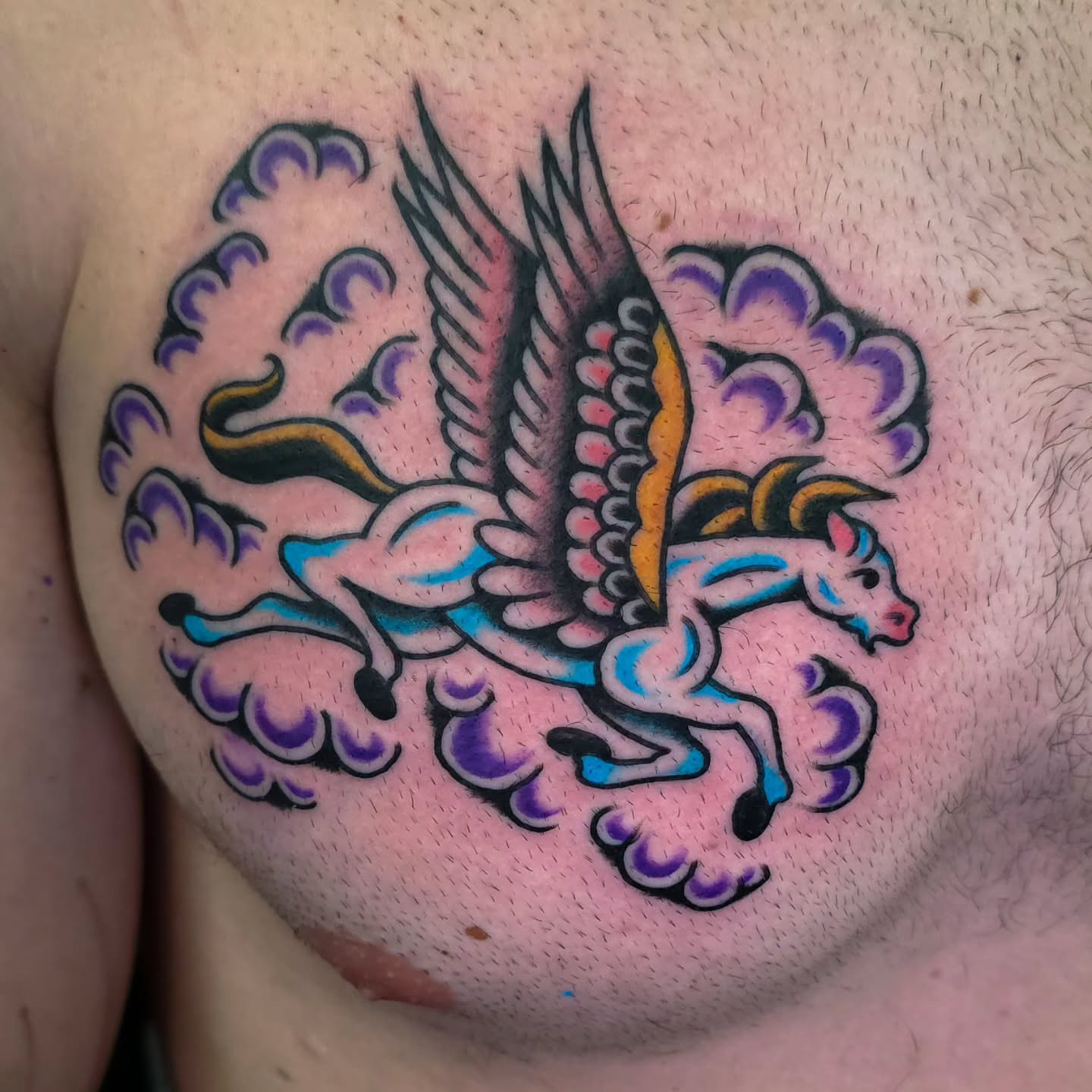 Pegasus American traditional tattoo on the chest by J. Kirsch New Jersey Tattoo Artist