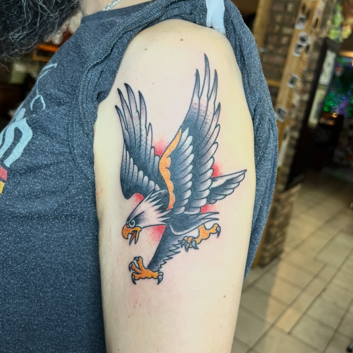 Eagle American traditional tattoo on the shoulder by Keith Underwood