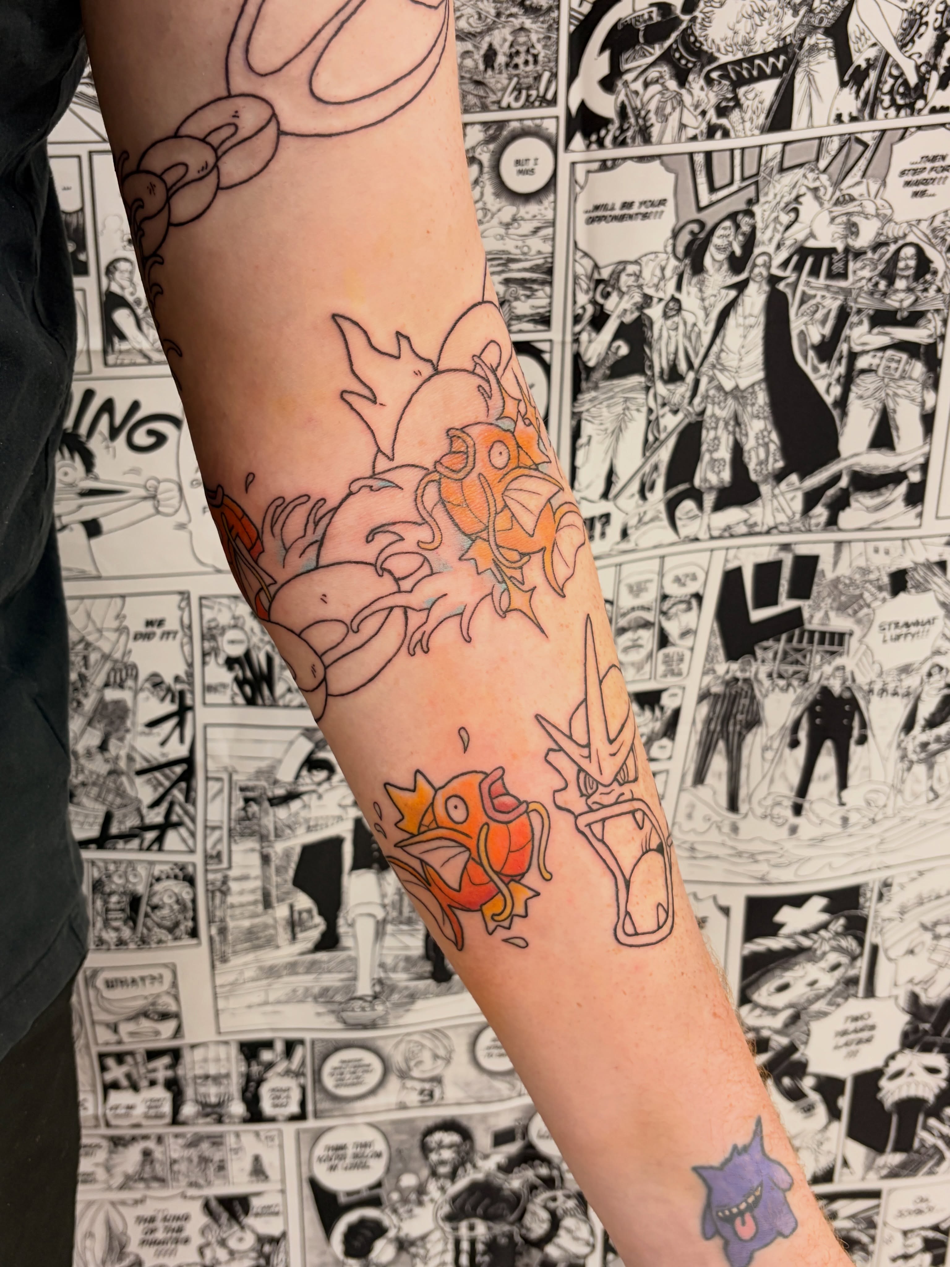 Pokemon characters anime tattoo on the forearm by Chris, Cleveland, Ohio