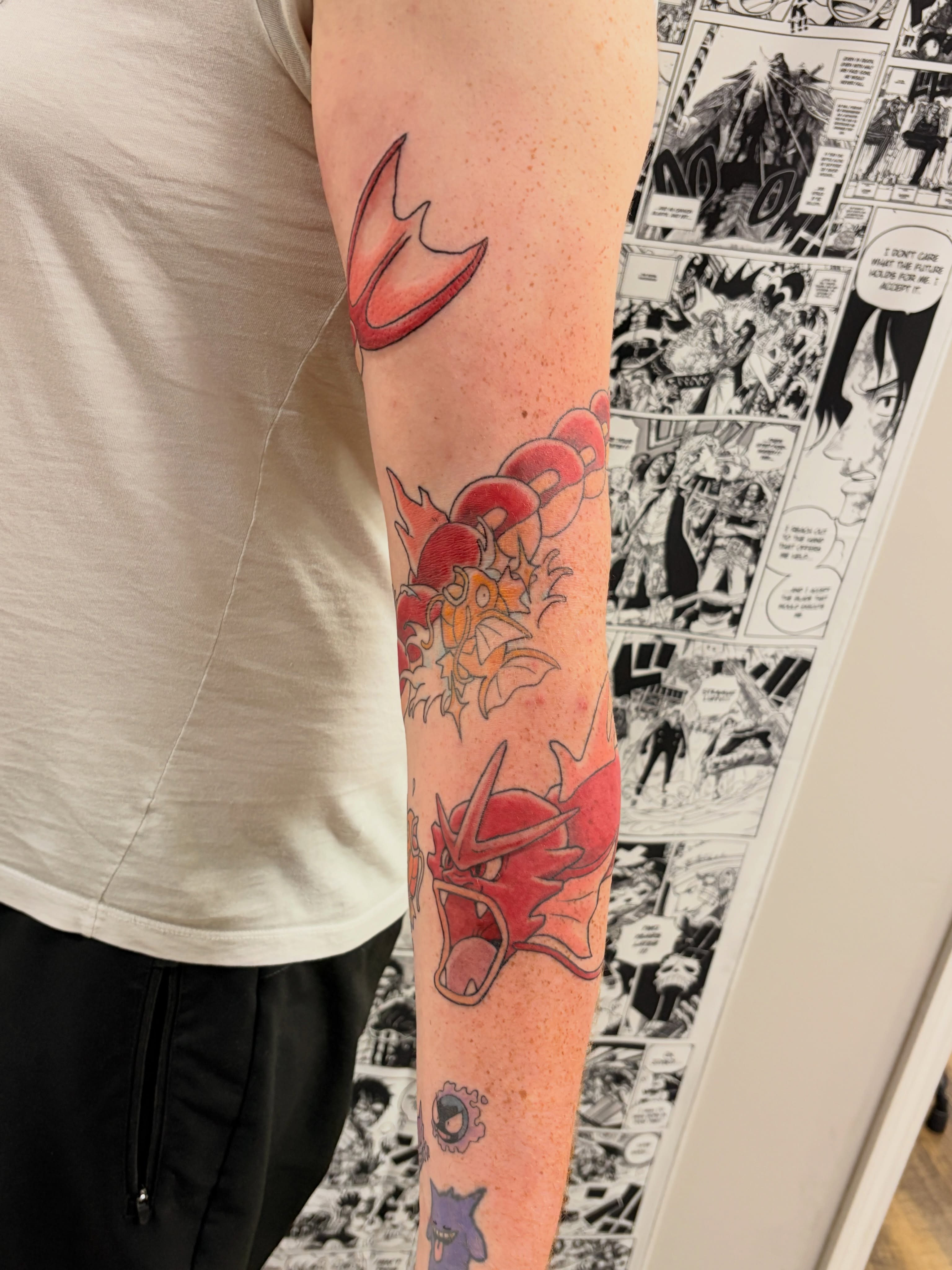 Pokémon Charizard anime tattoo on the forearm by Chris, Cleveland, Ohio