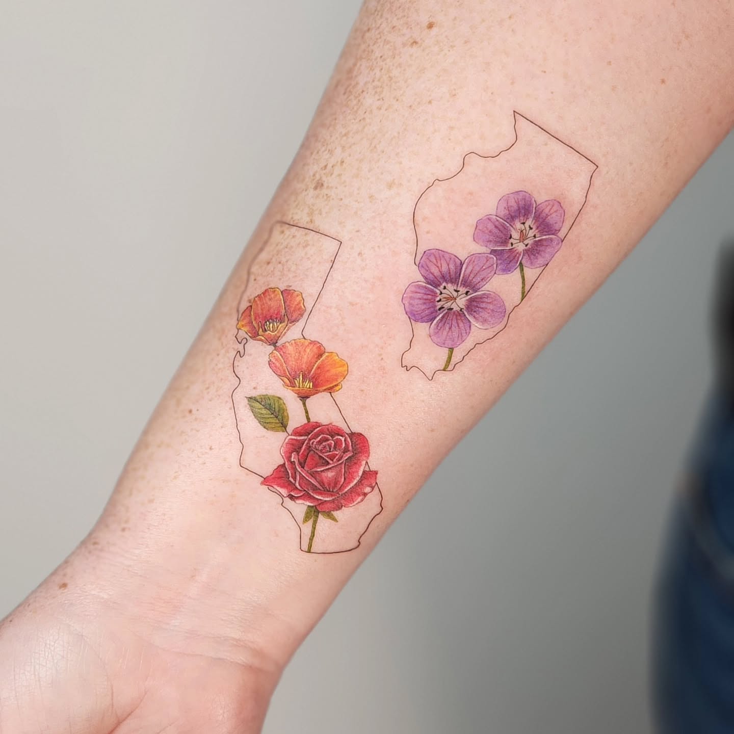 Flowers watercolor tattoo on the forearm by Tattoo artist - Luciana Dsilva, San Francisco, California