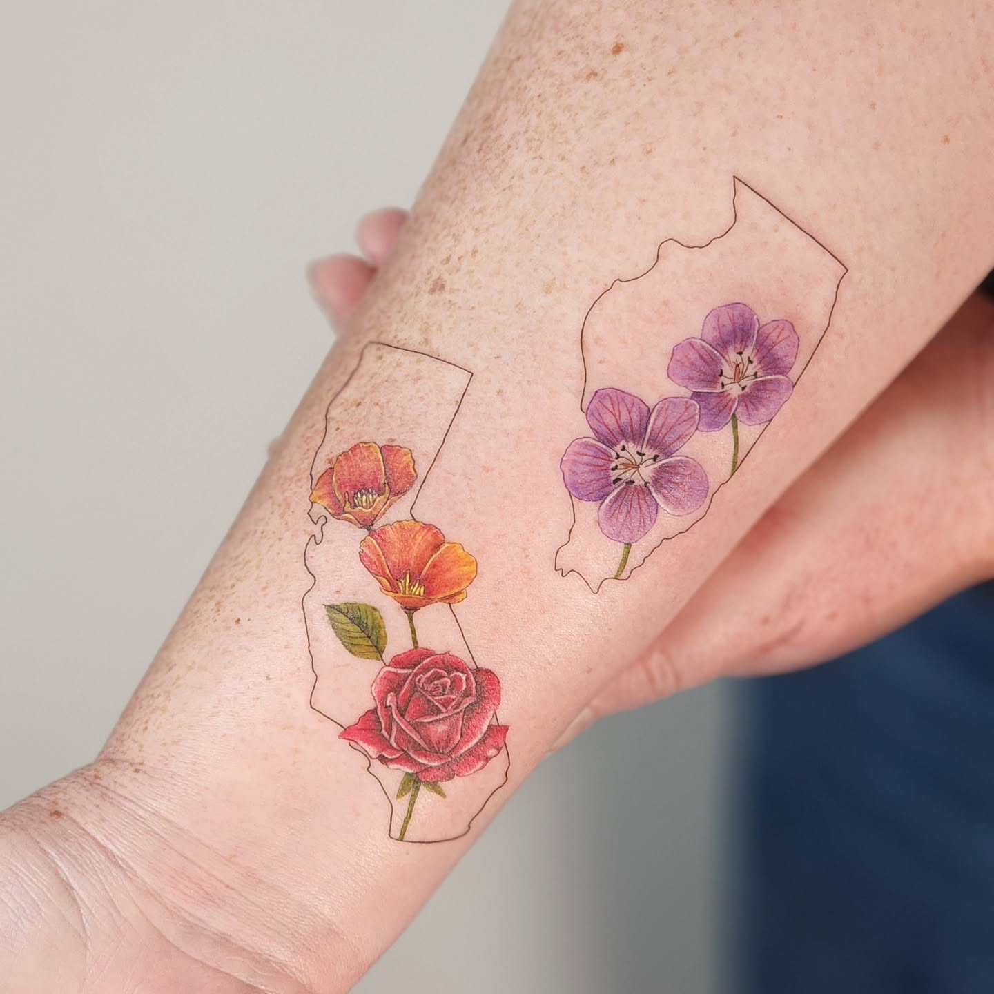 Flowers watercolor tattoo on the forearm by Tattoo artist - Luciana Dsilva, San Francisco, California