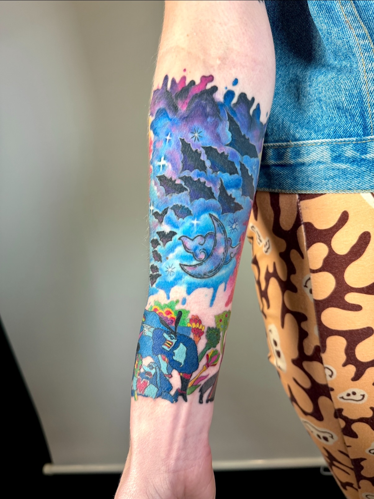 Fantasy landscape watercolor tattoo on the forearm by aria, Austin, Texas