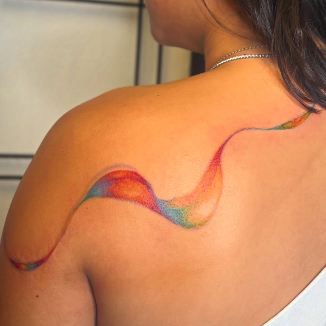 Swirl watercolor tattoo on the shoulder by ★ Val! ★ Tattoo Artist