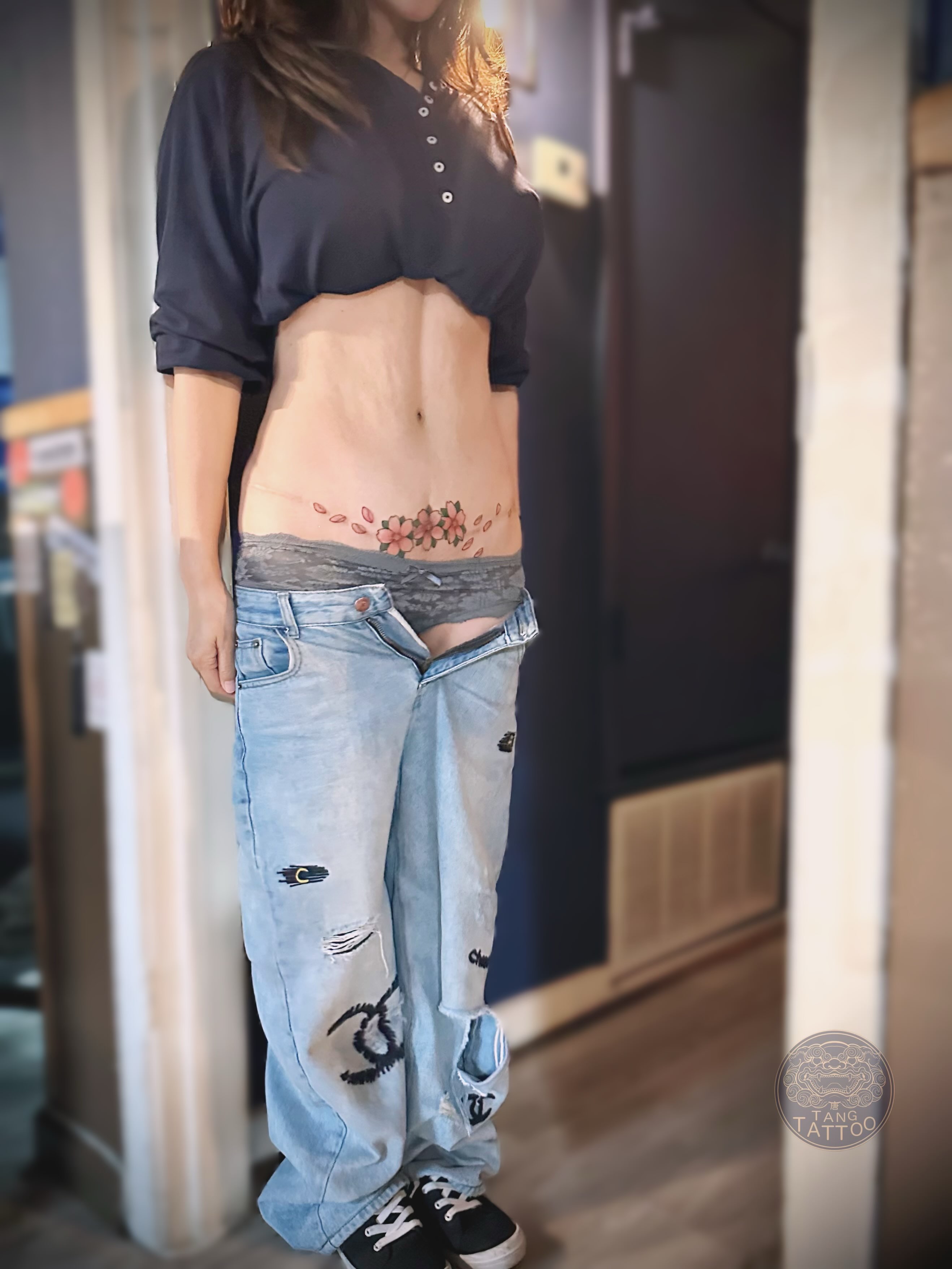 Cherry blossoms dotwork tattoo on the torso by Tang tattoo, Houston, Texas