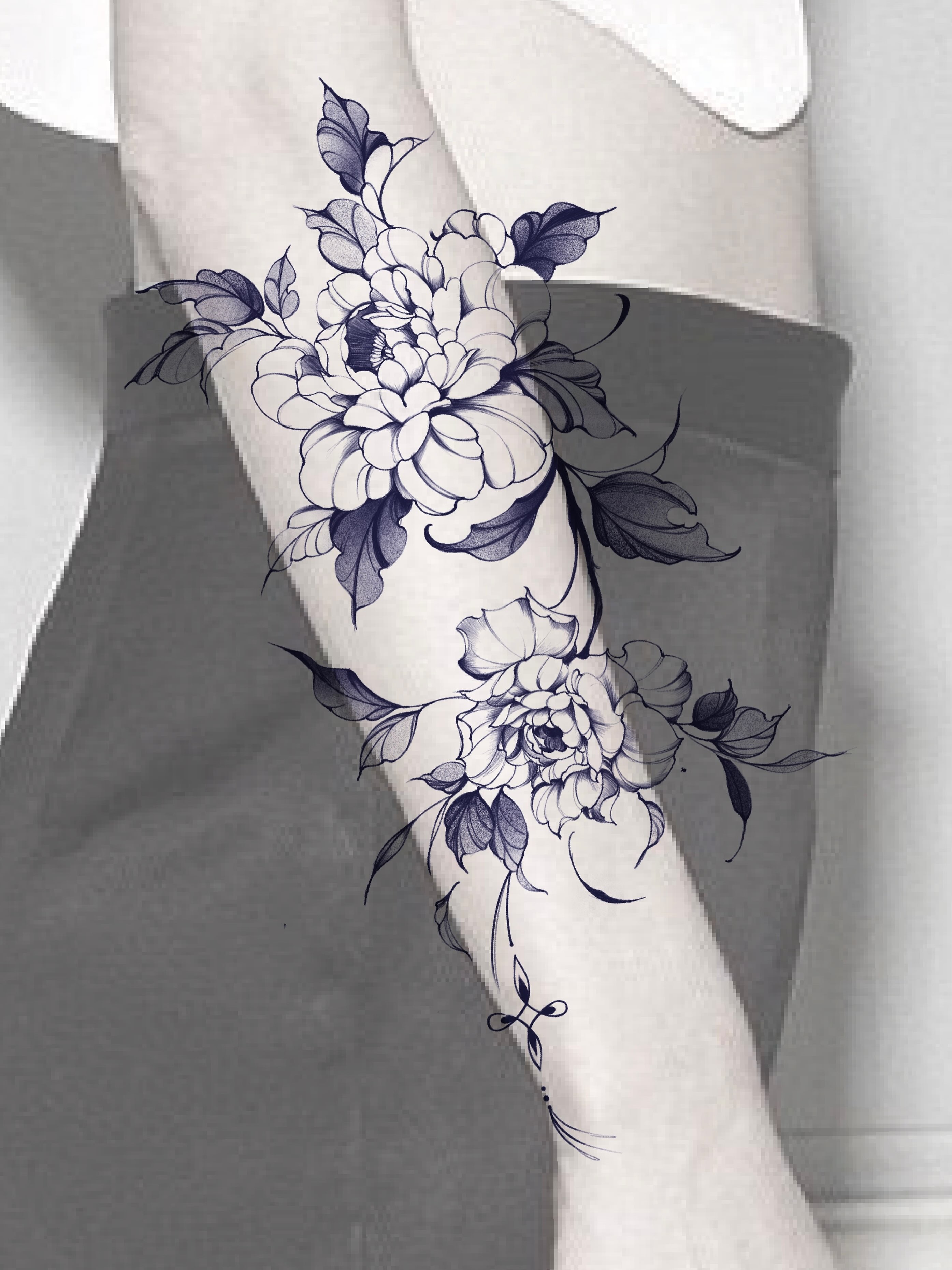 Floral bouquet black and grey tattoo on the forearm by Jinz