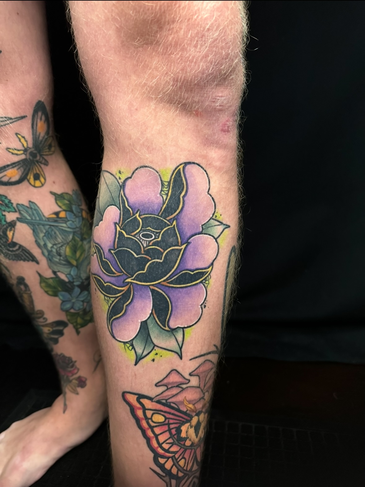 Lotus flower American traditional tattoo on the forearm by Chi, Charlotte, North Carolina
