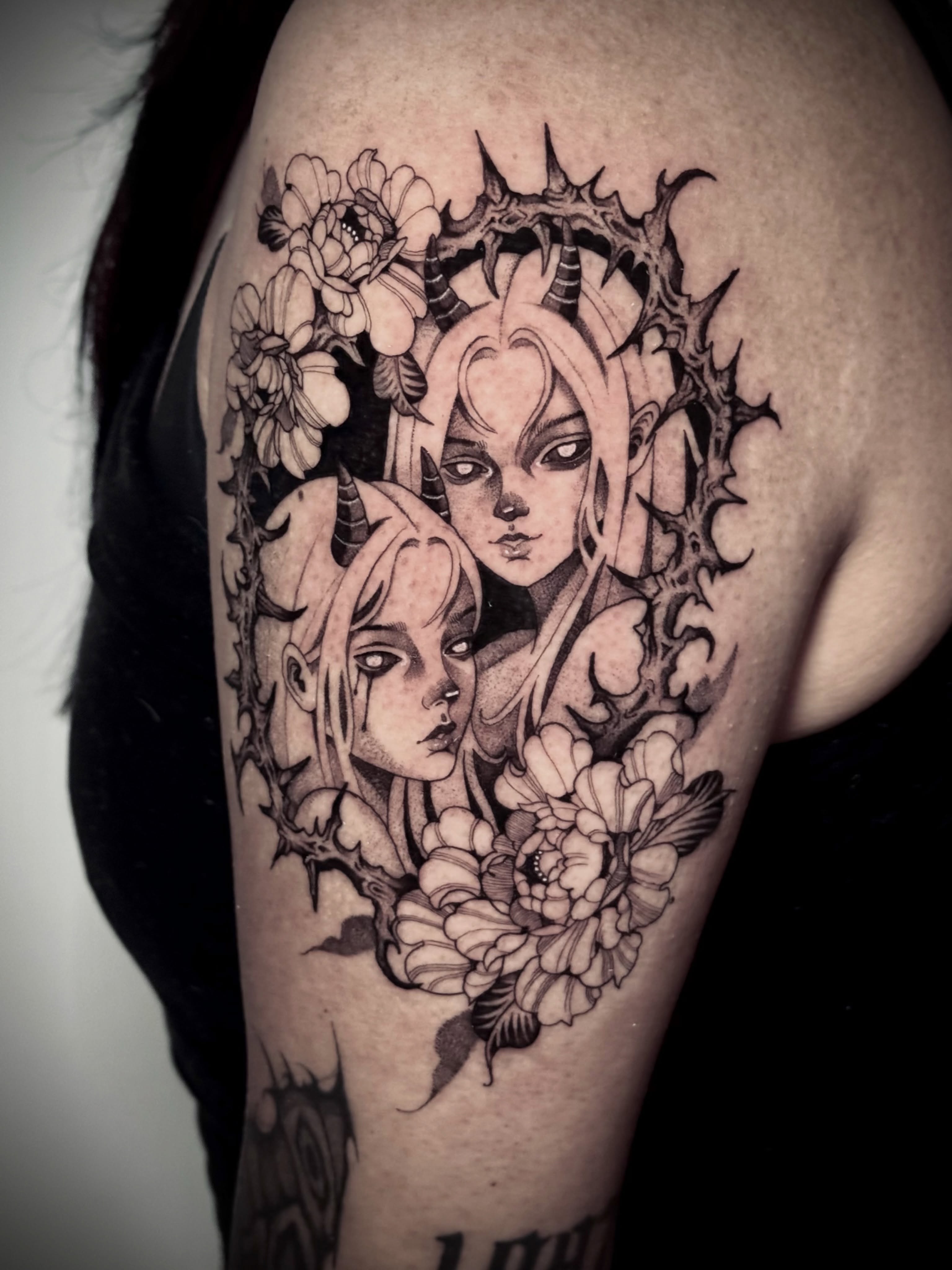 Twins with thorns realism tattoo on the shoulder by Melanie