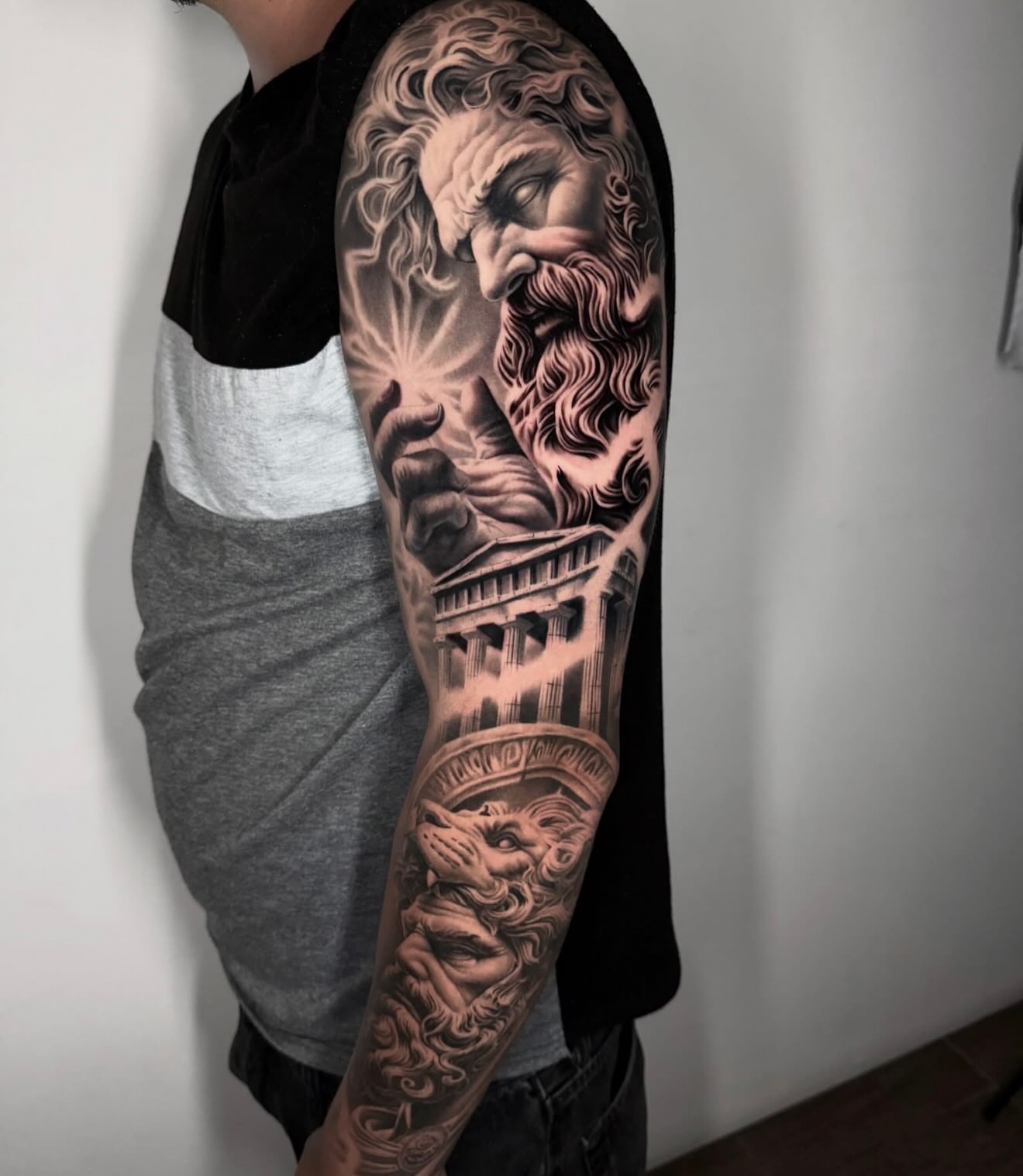 God-like figure realism tattoo on the forearm by Elijah Tattoos, San Diego, California