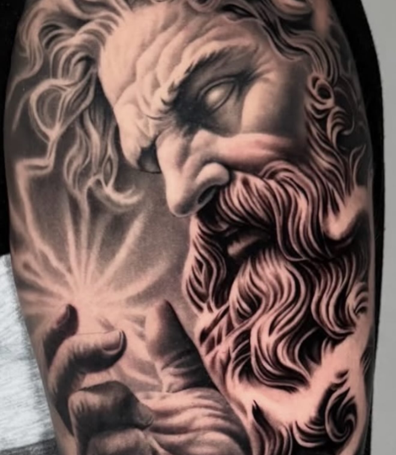 God-like figure realism tattoo on the forearm by Elijah Tattoos, San Diego, California