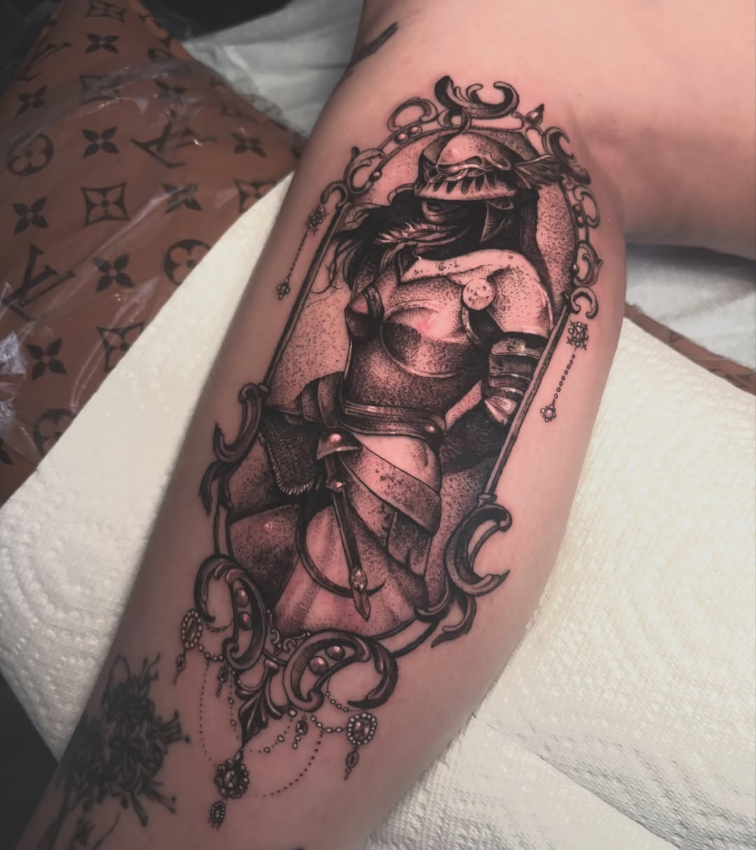 Female warrior realism tattoo on the forearm by Alle
