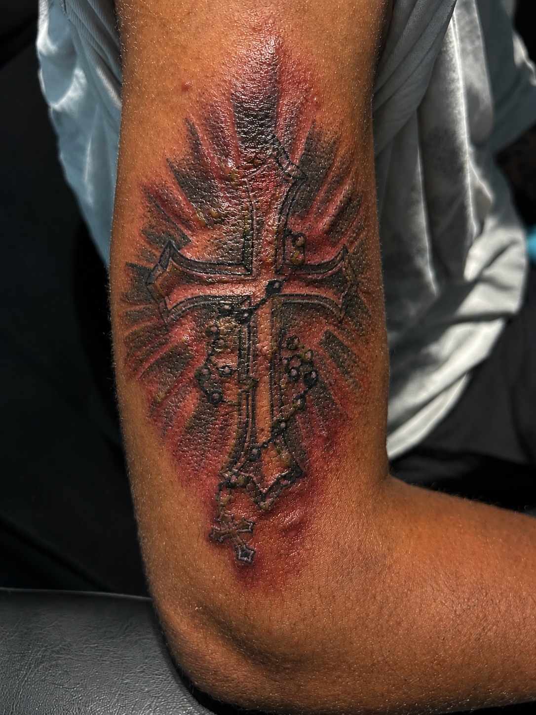 Cross American traditional tattoo on the forearm by @tatzbythadon