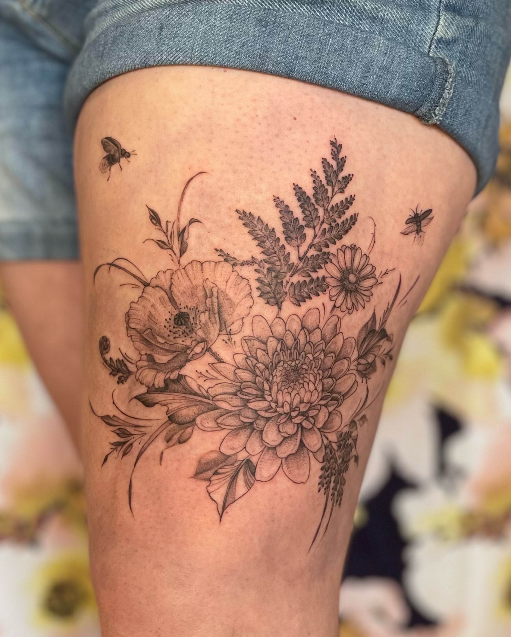 Floral bouquet realism tattoo on the thigh by paige  l  ink shrink tattoo