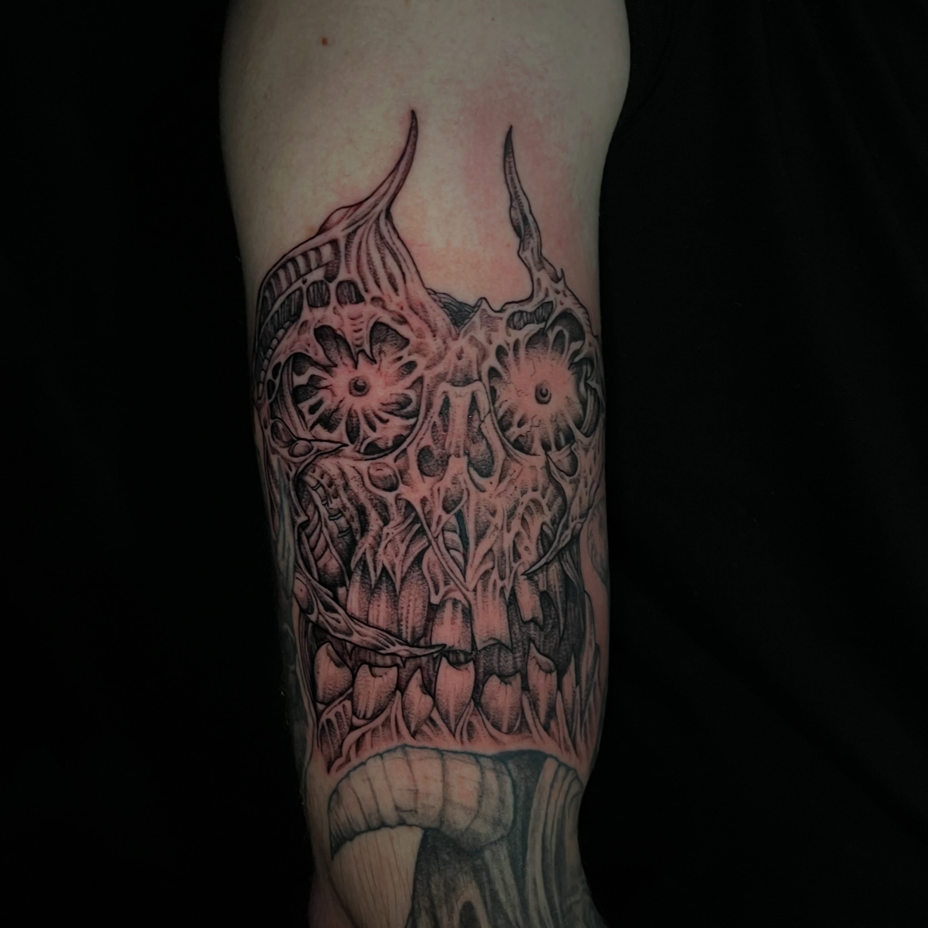 Cyborg skull dark realism tattoo on the forearm by Crawlspacecadet