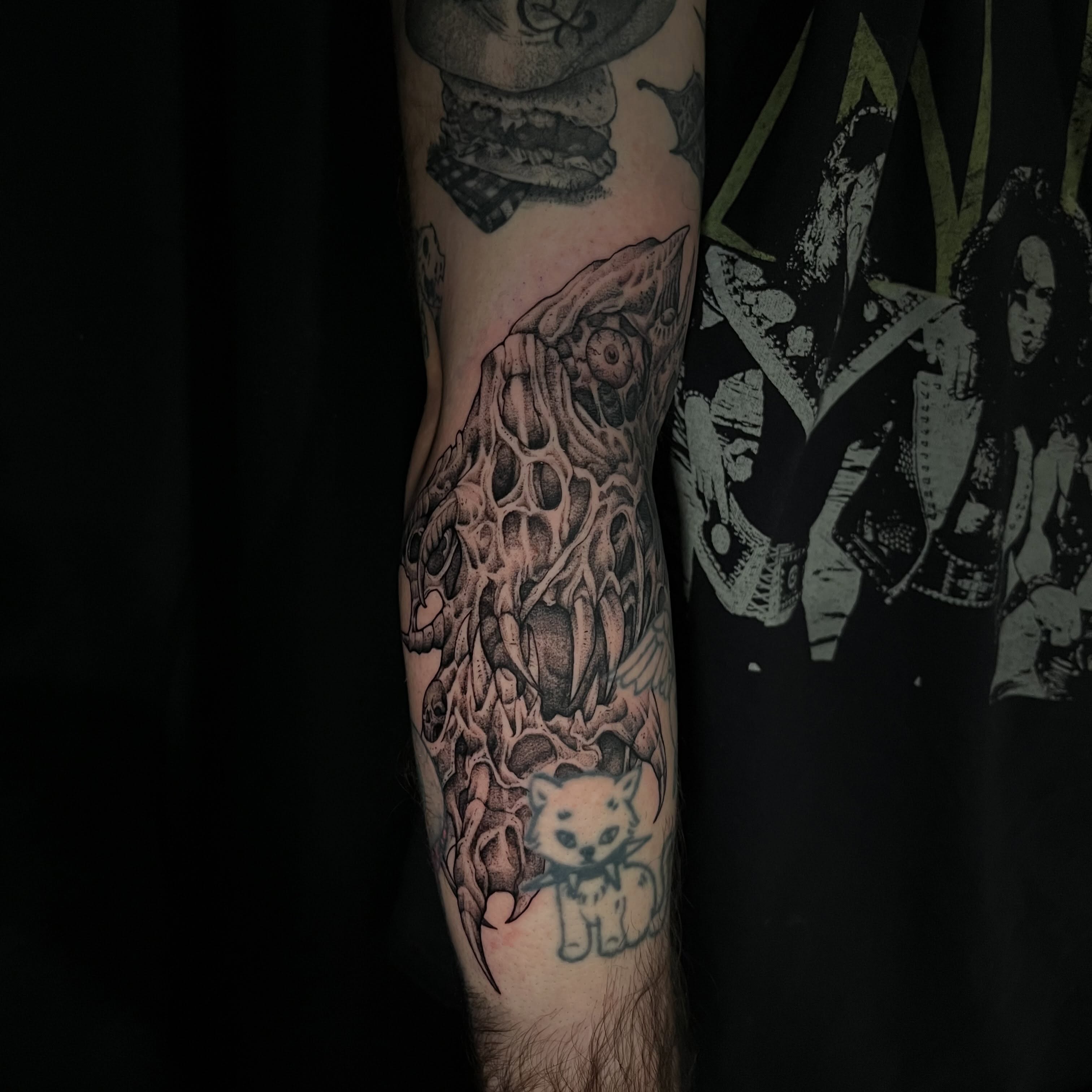 Cat skull realism tattoo on the forearm by Crawlspacecadet