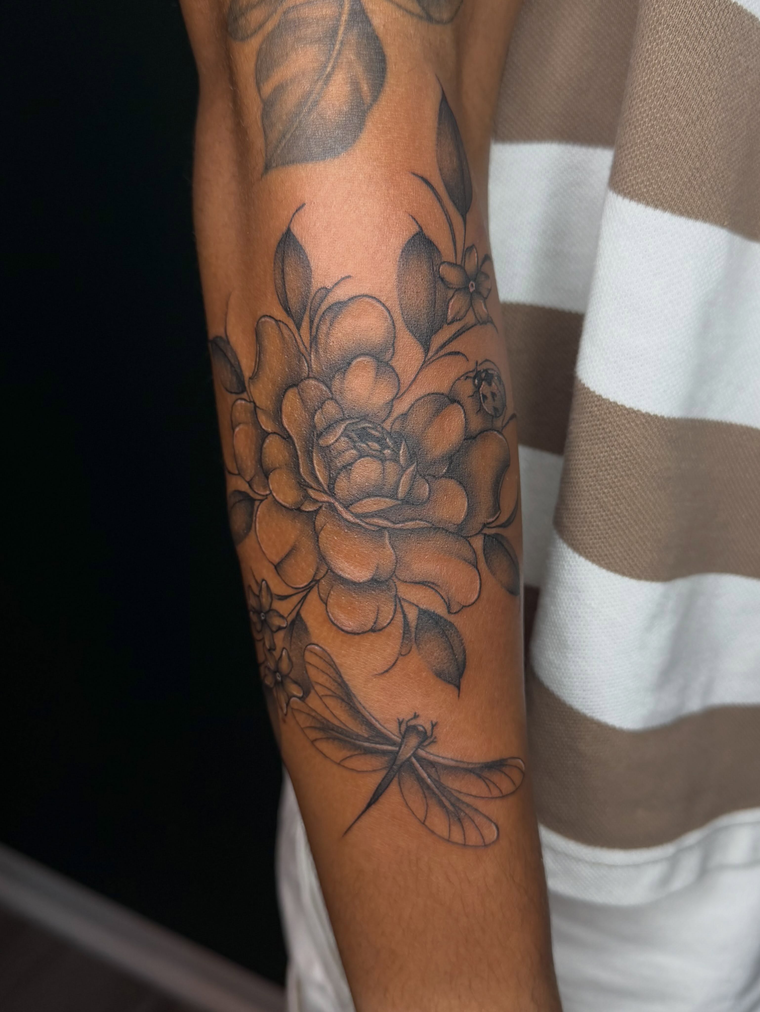 Peony and dragonfly realism tattoo on the forearm by ༺☆༻