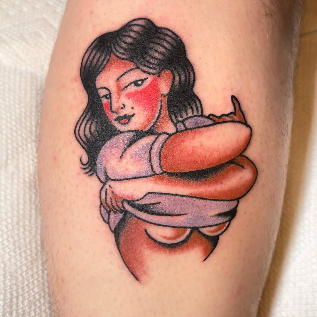 Woman American traditional tattoo on the upper arm by Caeli Martin