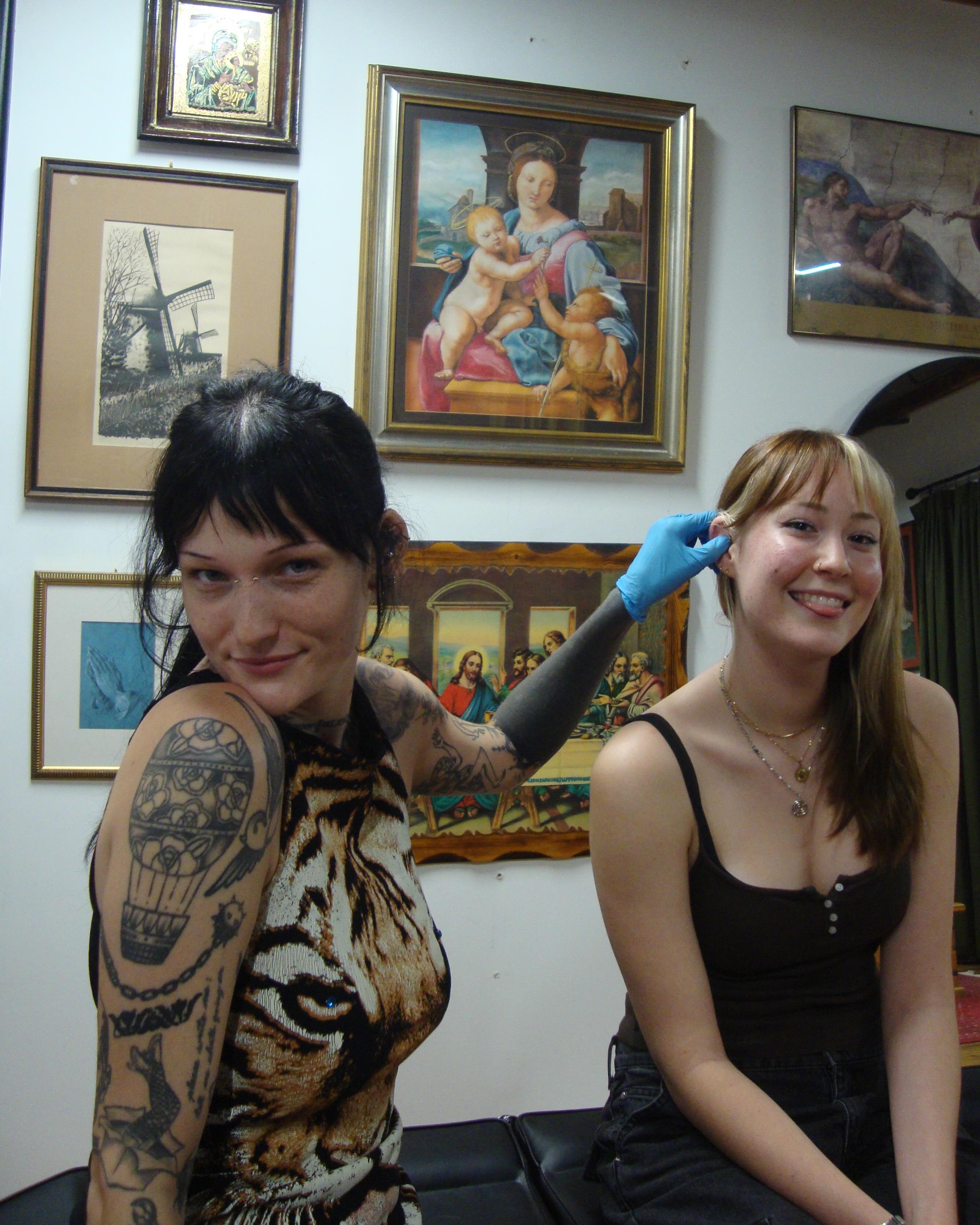 Tiger American traditional tattoo on the torso by Sienna (jj) Hicks